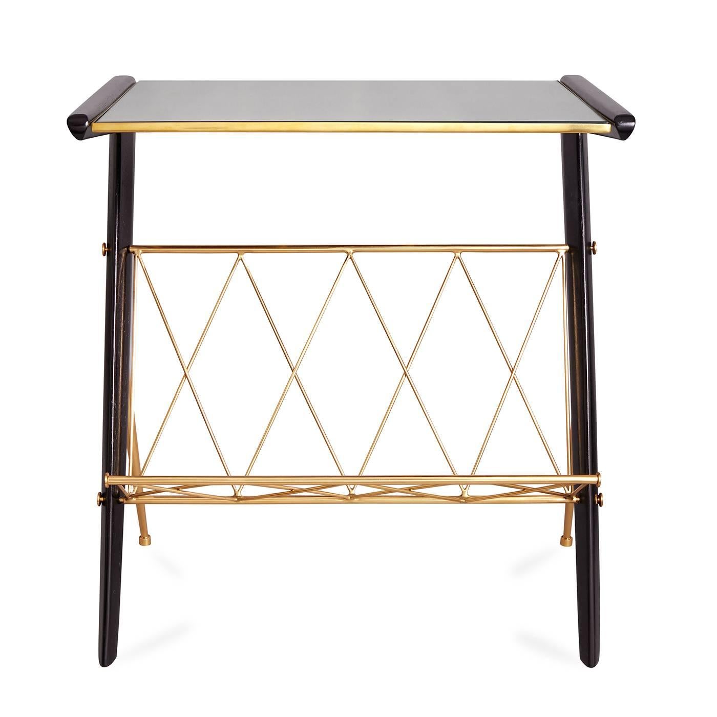 French flair. Posh up your pad with our ultra-useful and unexpected end table/magazine rack. A slim and dynamic ebonized wood frame is complemented by corset-inspired detailing in brass and an antiqued mirror top. Our St. Germain side table is the