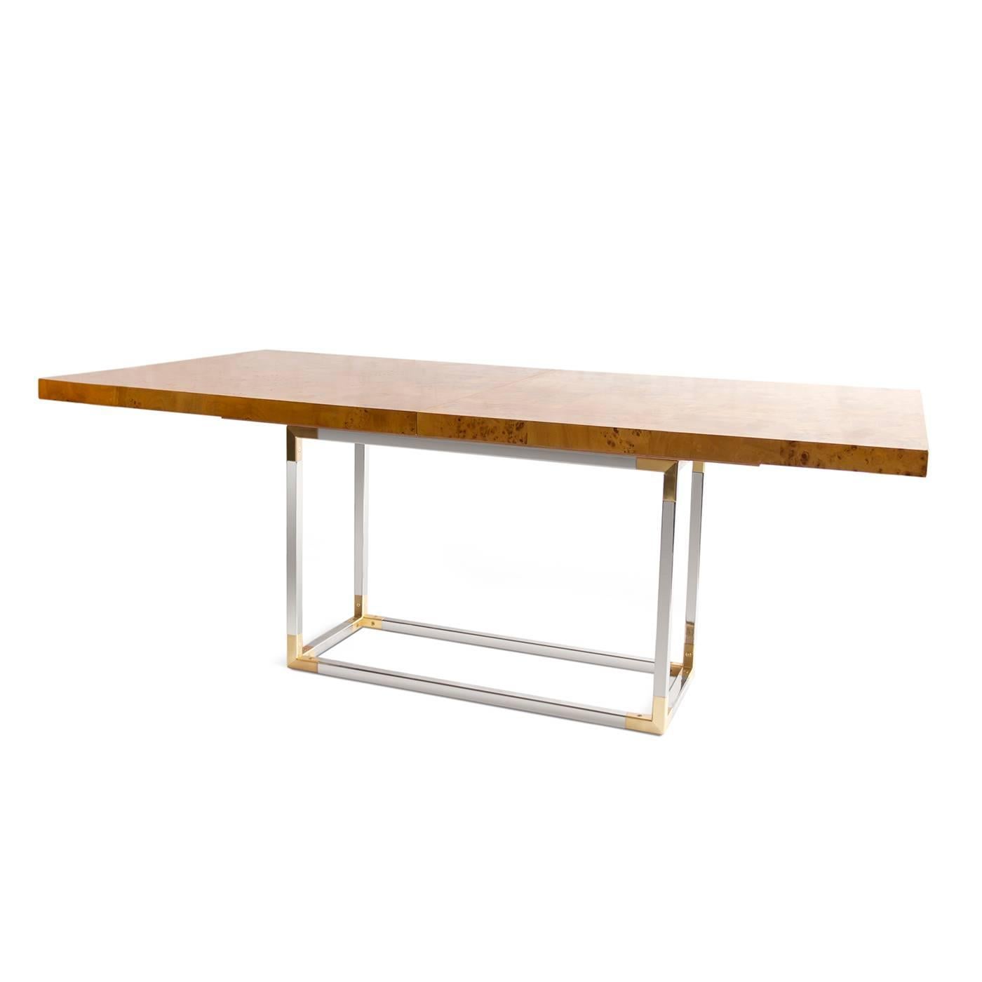 Timelessly chic. Pieced, burled mappa top with a wonderfully durable satin matte finish on a polished nickel base with matte brass Campaign corners. A removable 20 inch leaf extends the table to comfortably seat up to 10, at a max length of 100