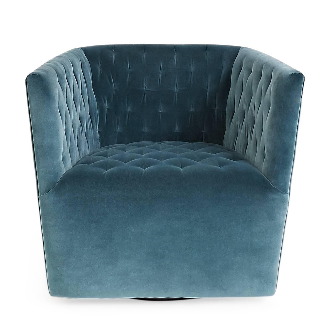 Swivel in style. Cocoon-like form with nifty tufting detail upholstered in rich petrol velvet. Demure in scale but powerful in presence, the Vertigo swivel chair is our modern interpretation of a classic barrel club chair. Works beautifully as a