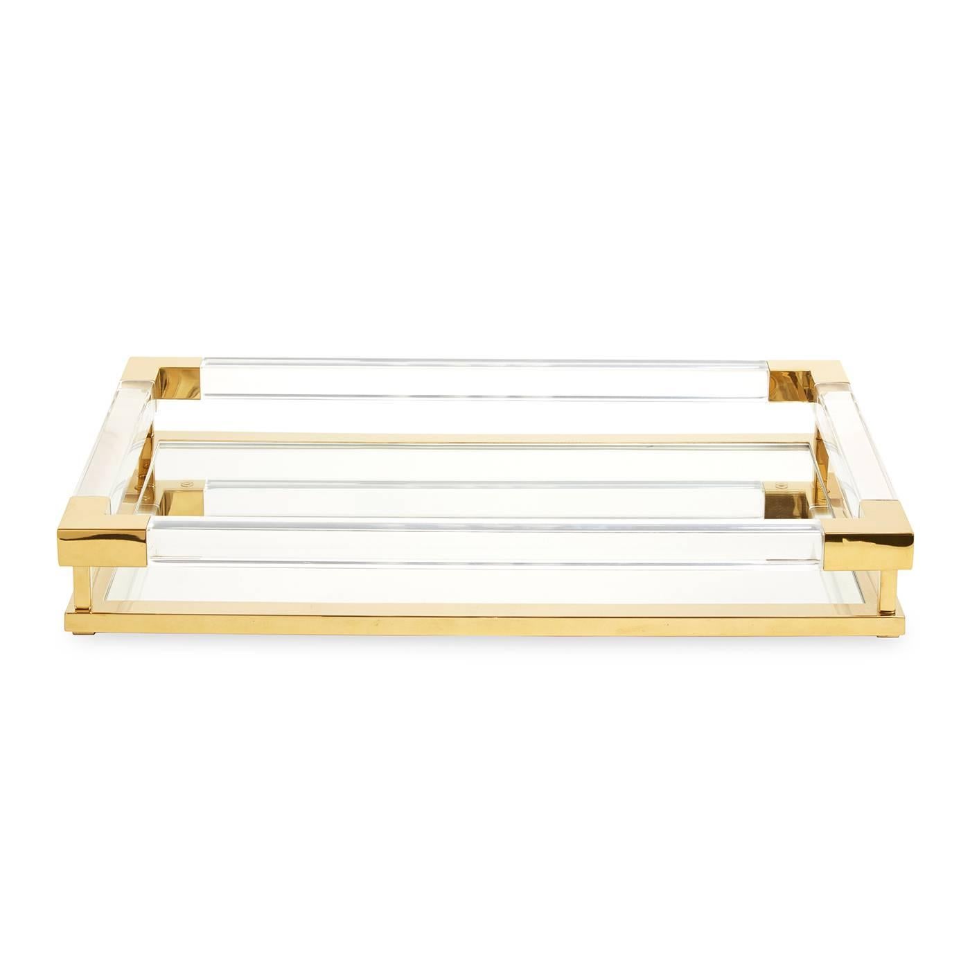 Clearly cool. Our Jacques collection is the perfect blend of simplicity and glamour, modern and traditional. Corral your prized possessions without crowding your space. Available in ethereal transparent Lucite with polished brass accents. In a size