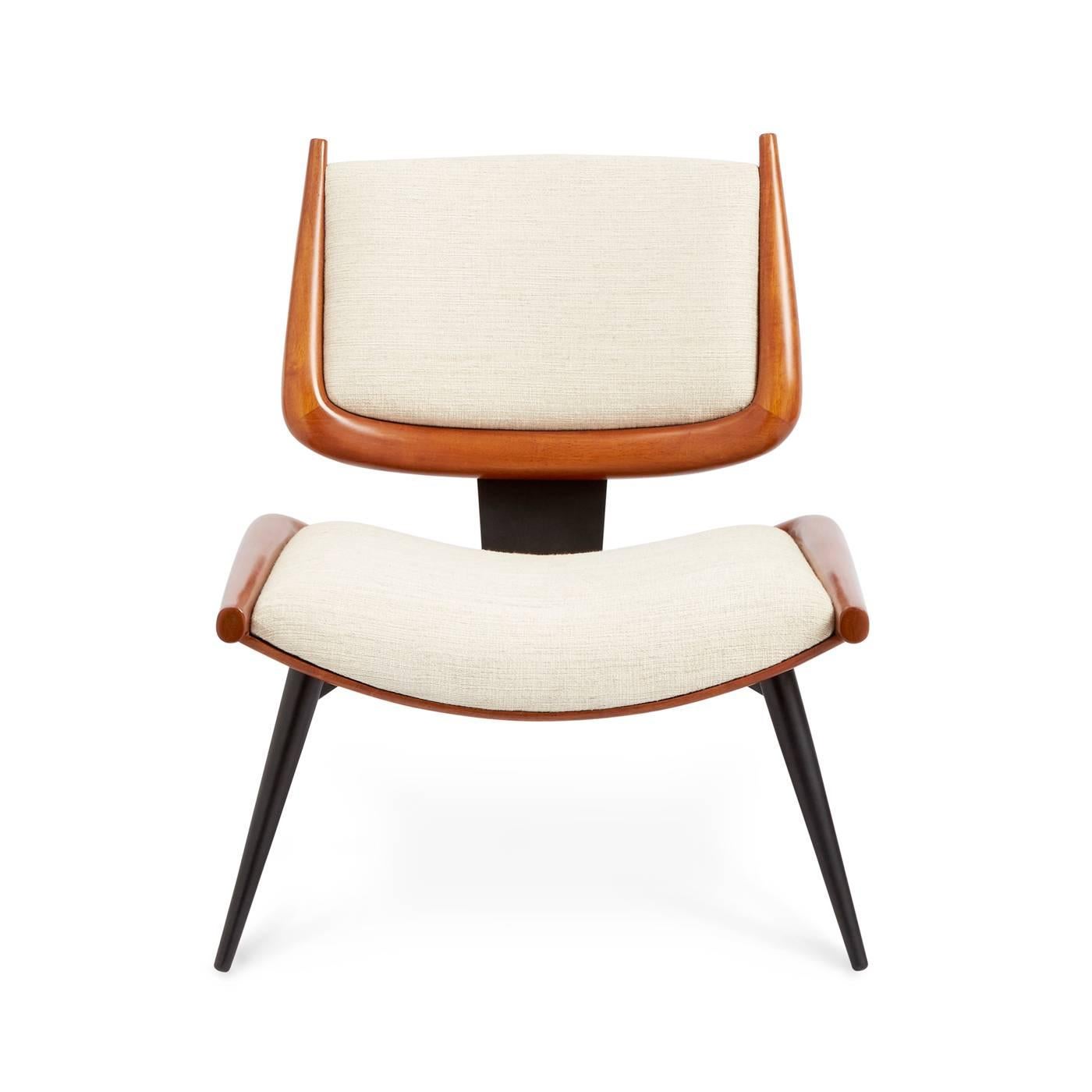 Warm Modernism. As chic from the back as it is from the front, the St. Germain accent chair features a dash of Japanese rigor, a hint of Scandinavian Modernism, and a full dose of chic.

Low and loungey with a curvy and comfortable seat and an
