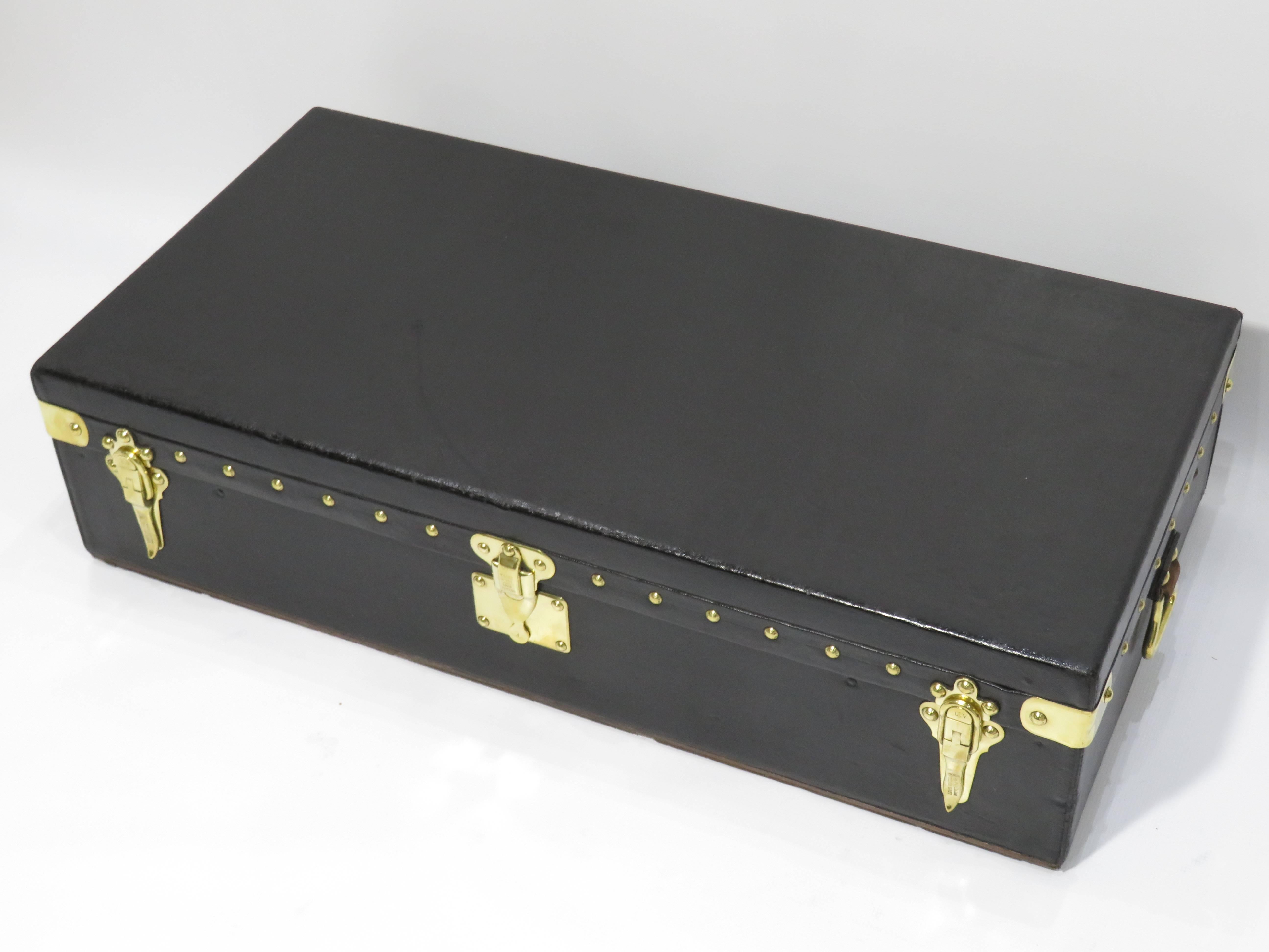 1910s, Louis Vuitton motor trunk in excellent condition.
Black waterproof canvas, brass lock, brass latches and handles.
 