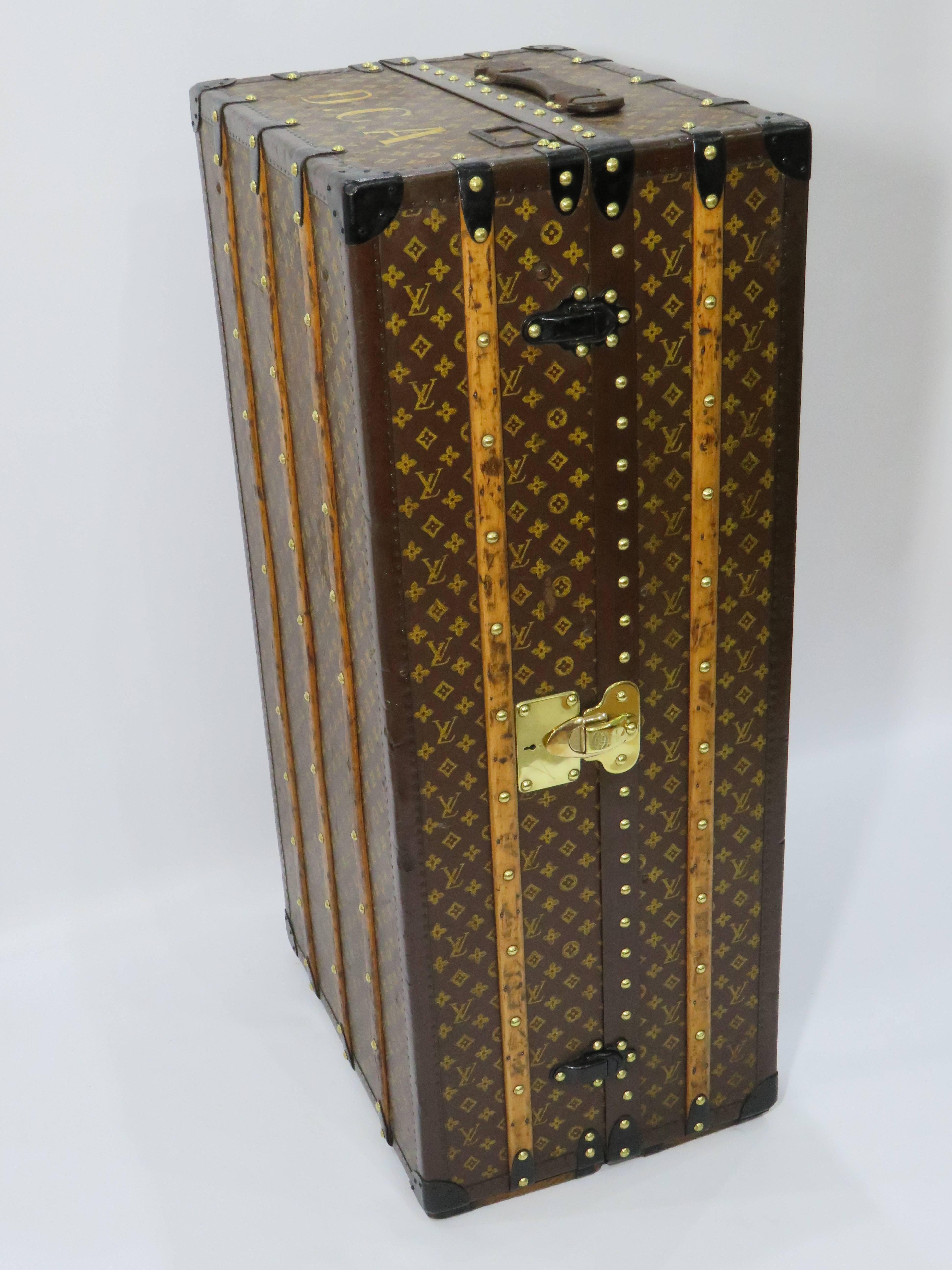 For sale a beautiful example of an early 20th century Louis Vuitton monogram wardrobe trunk with steel hardware, brass lock and brown monogram stamped lozine.

In remarkably good condition for age as clearly seen in the photos.