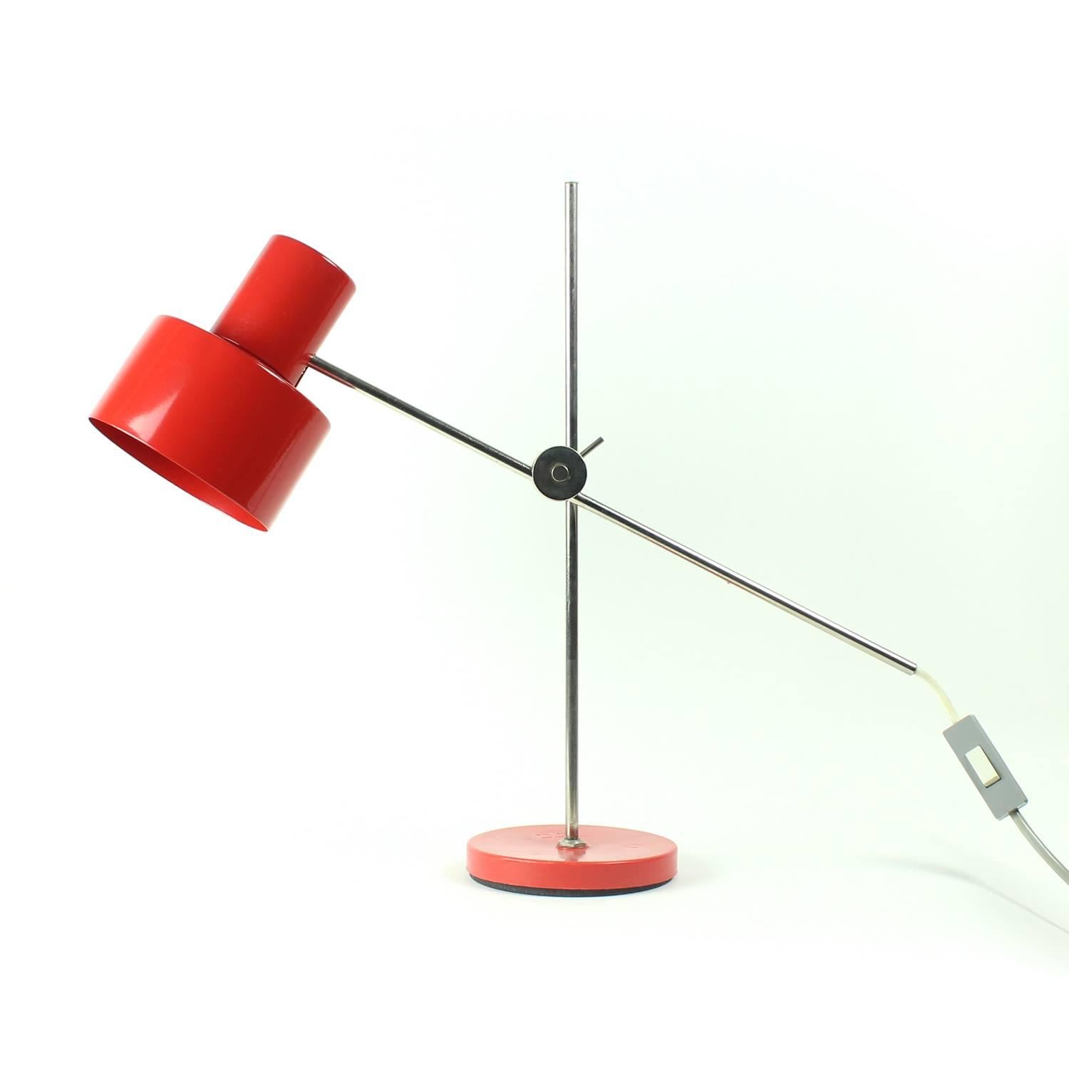 This simple and stylish lamp named type 1012 01 comes is considered an icon in the Czechoslovakian design history. Produced by Elektrosvit National company in Czechoslovakia, designed by Jan Suchan as one of his first designs when he was just 26.