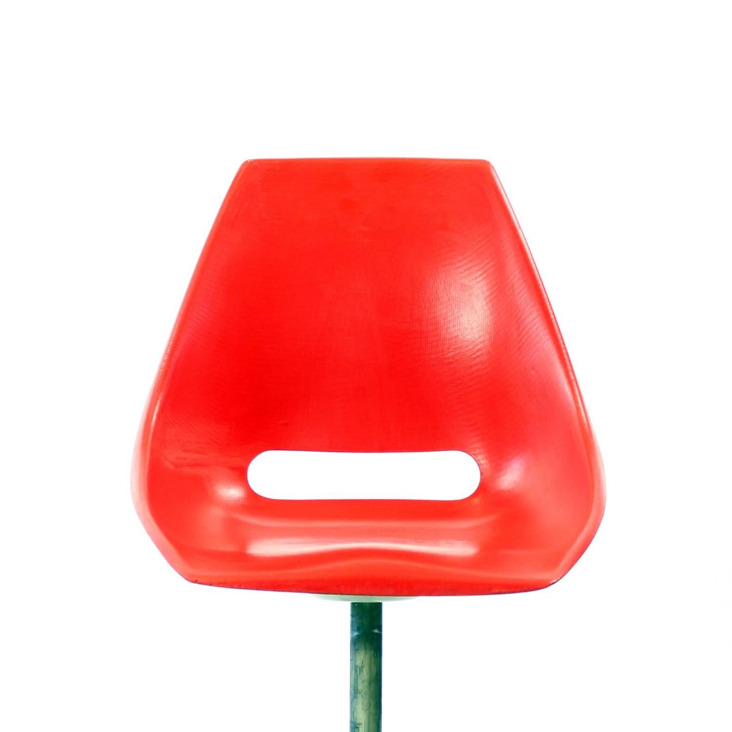 Beautiful, midcentury chairs in original red fiberglass. Designed by Miroslav Navratil for Vertex company. The seat model was used in Czechoslovakian trams. this model has different metal base and is ment as a factory chair. Industrial model with