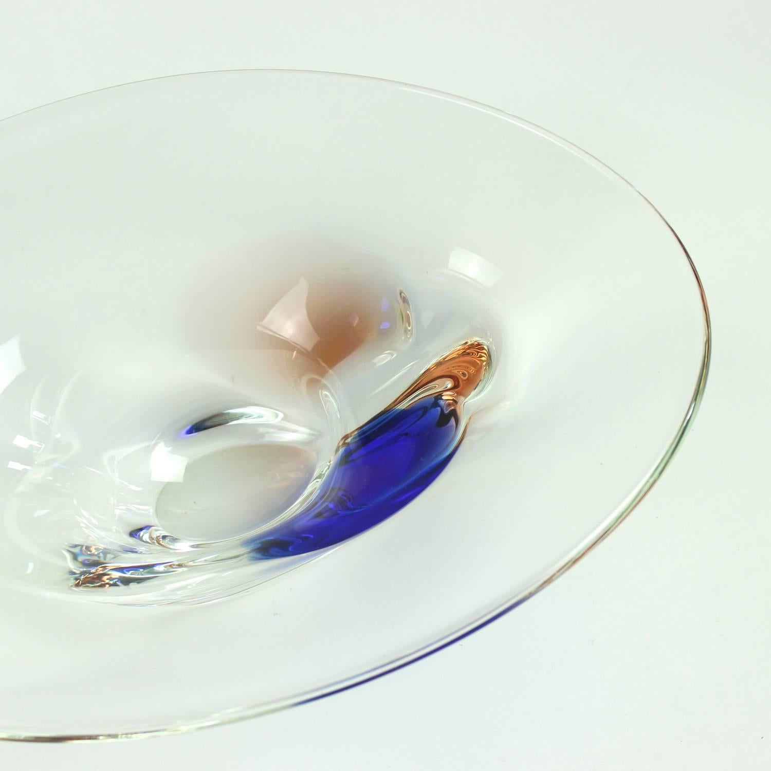 Beautiful and elegant item. Art glass bowl of metallurgical glass, manufactured by Borocrystal in 1960s. Unique design, so typical for the Czech glass making tradition. Made of clear glass with details of rosé and cobalt blue glass. Very good