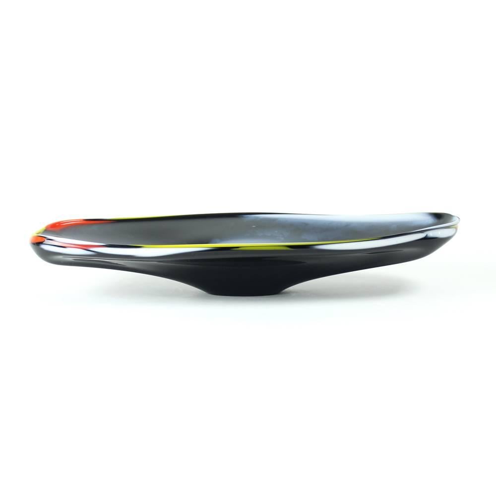 Unique and purely beautiful glass bowl. Made of heavy metallurgical glass. Designed by Josef Rozinek for Borocrystal / Borske Sklo Glassworks in 1960s as part of the Czech glassmaking tradition. Base of the black glass is marbles with white, yellow