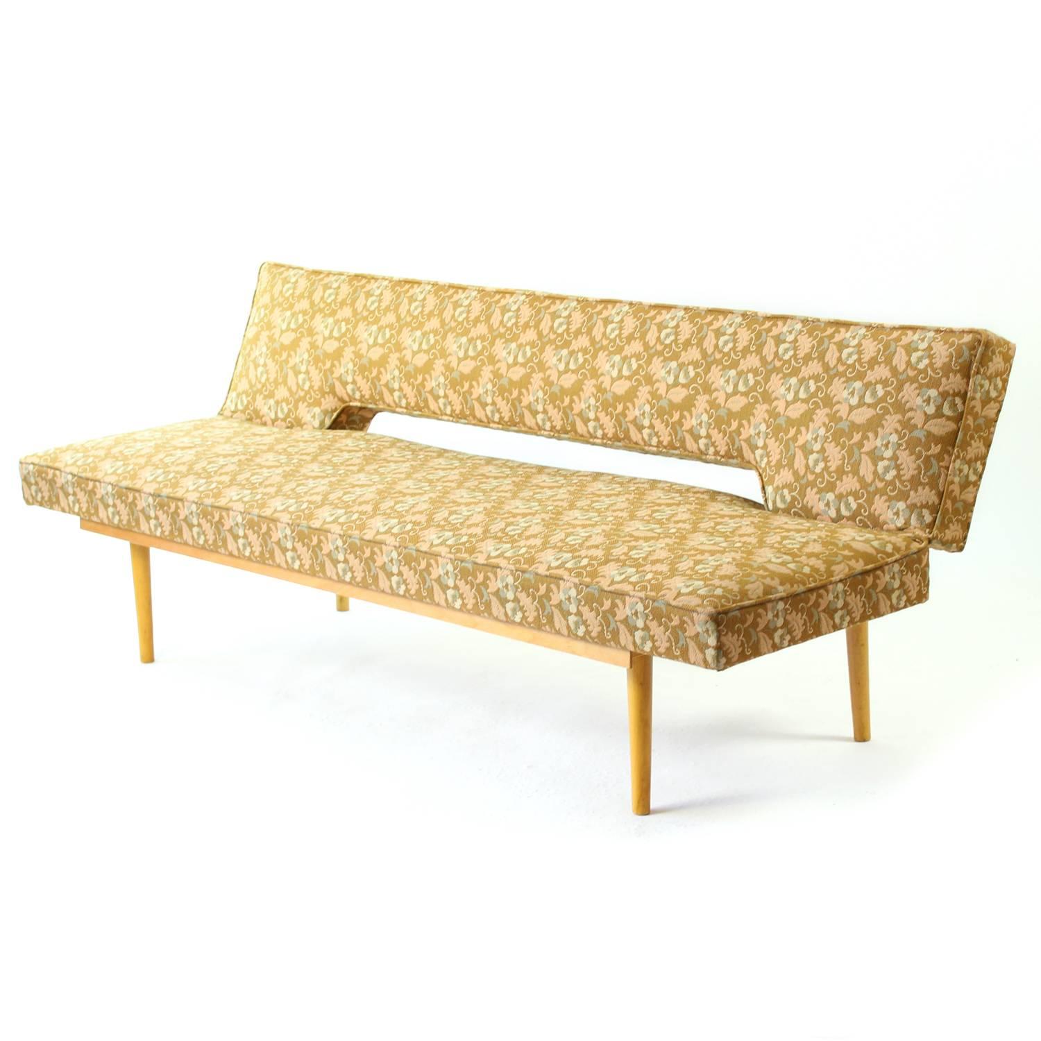 Beautiful daybed commonly called "Swedish bench" in Slovakia. Simple and elegant design by Miroslav Navratil. Design typical for midcentury era. Practical and very simple mechanism makes this sofa into a bed in few seconds. Original but