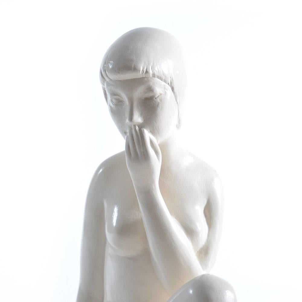A statue of ashamed young girl. Made of glazed gypsum in a very good, original condition without any wear. Typical vintage item which combines the beauty of a woman with a fear of a girl. Beautiful item, ideal for modern interiors.