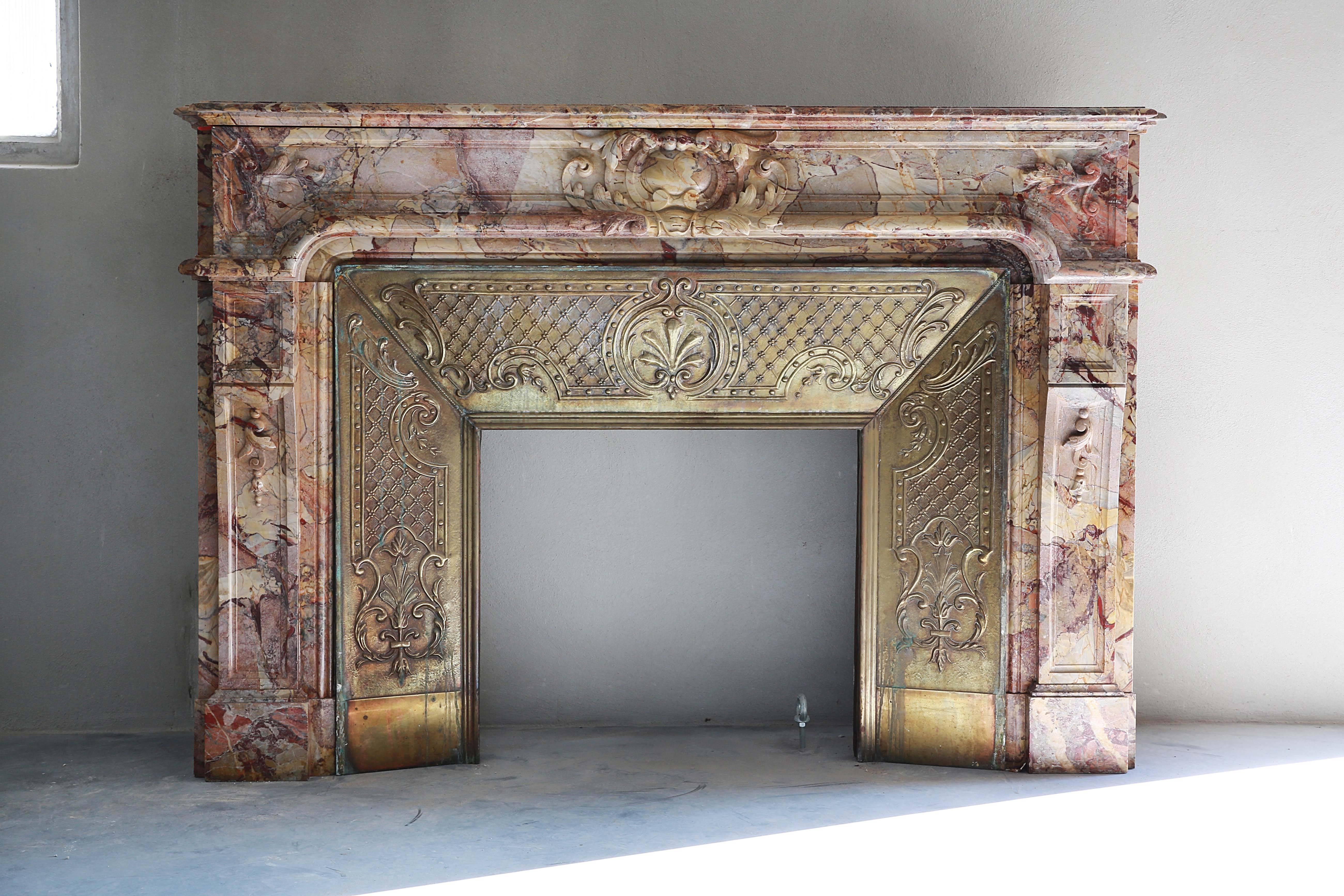 Beautiful marble fireplace of Sarrancolin! A really very specific and unique kind of marble, build in the 18th century.