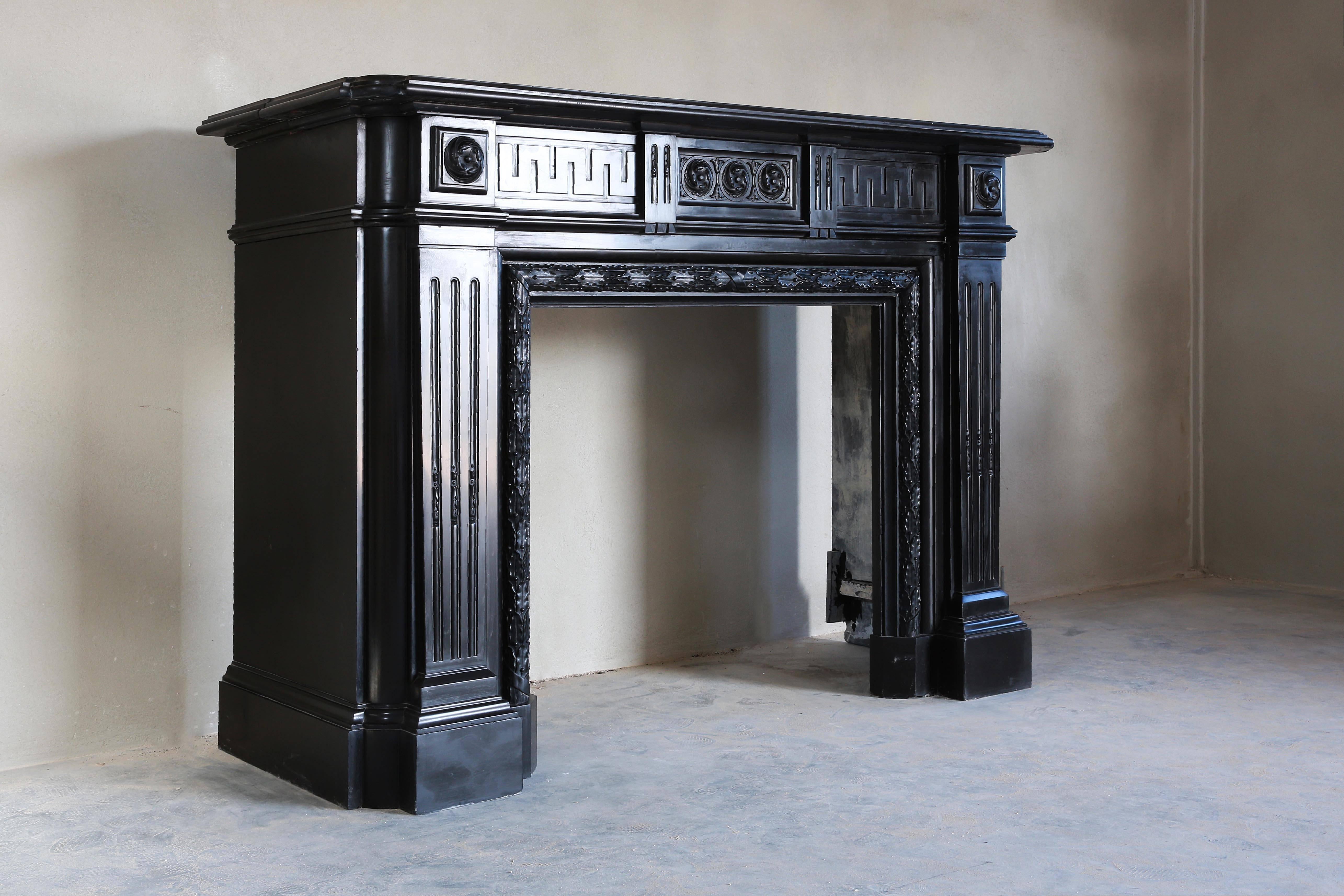 Monumental Louis XVI black marble mantle in excellent condition. A true masterpiece.
The carving is of such a high quality showing the true art of the stonemason.
This is an one of a kind antique mantel which could be used in any timeless