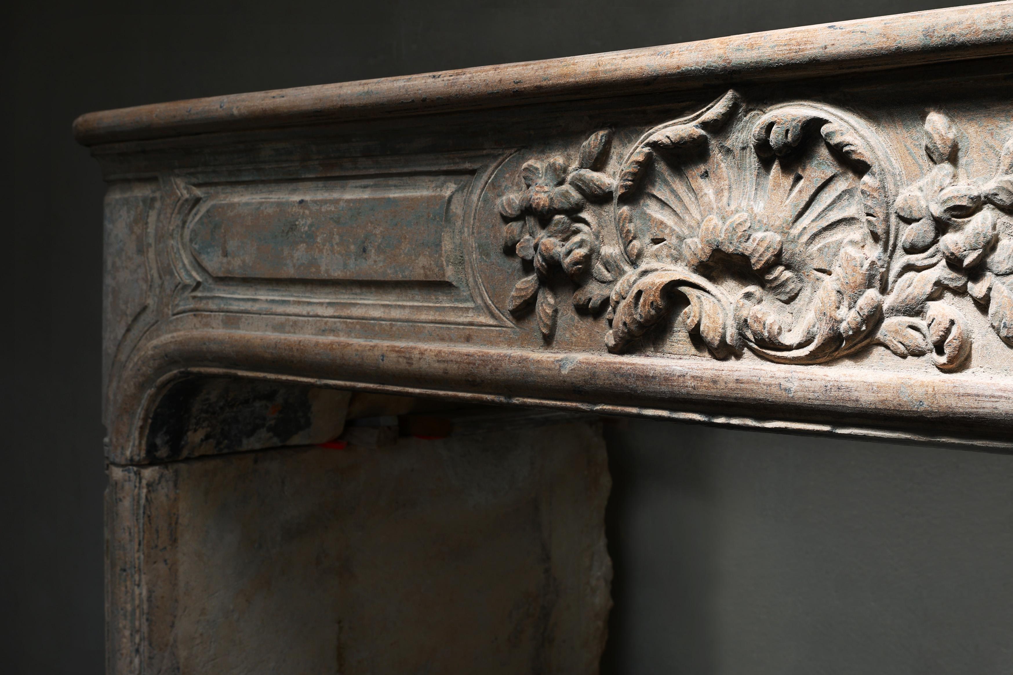 Limestone Antique mantle surround of French limestone from the 19th century For Sale