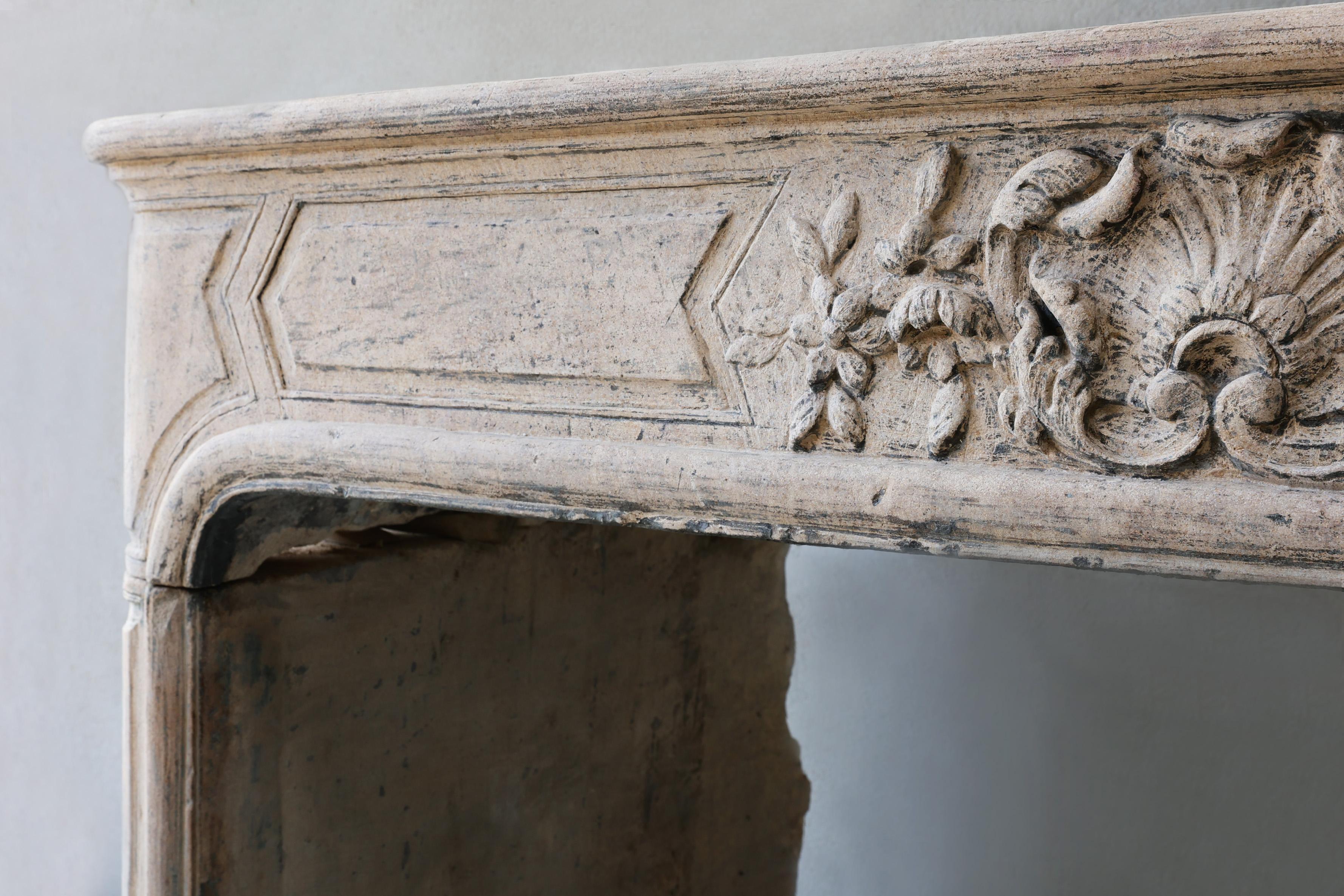 Limestone Antique mantle surround of French limestone from the 19th century, Louis XIV For Sale