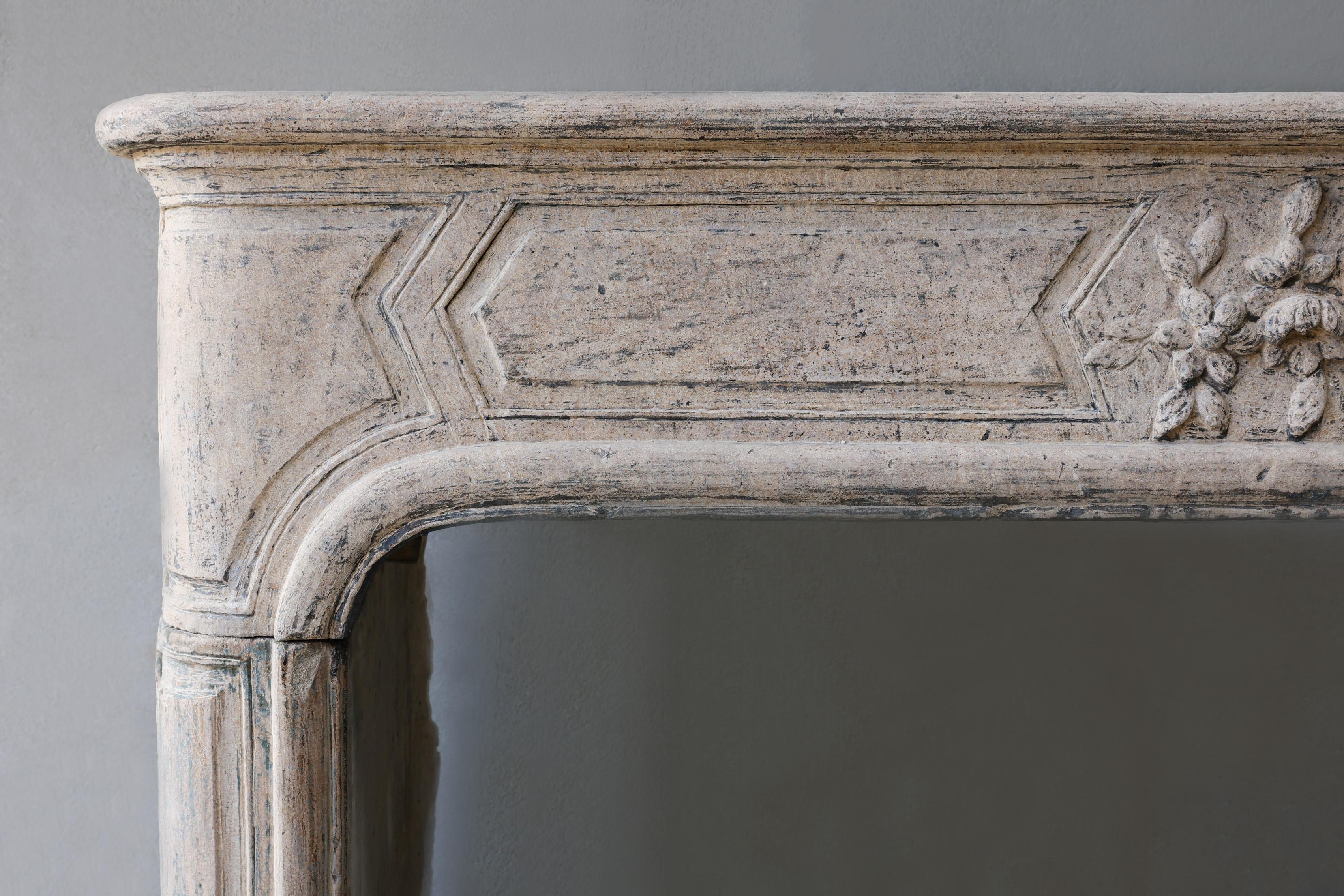 19th Century Antique mantle surround of French limestone from the 19th century, Louis XIV For Sale