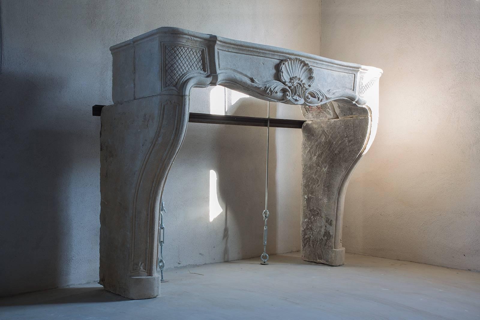 French 19th Century Limestone Fireplace in the Style of Louis XV