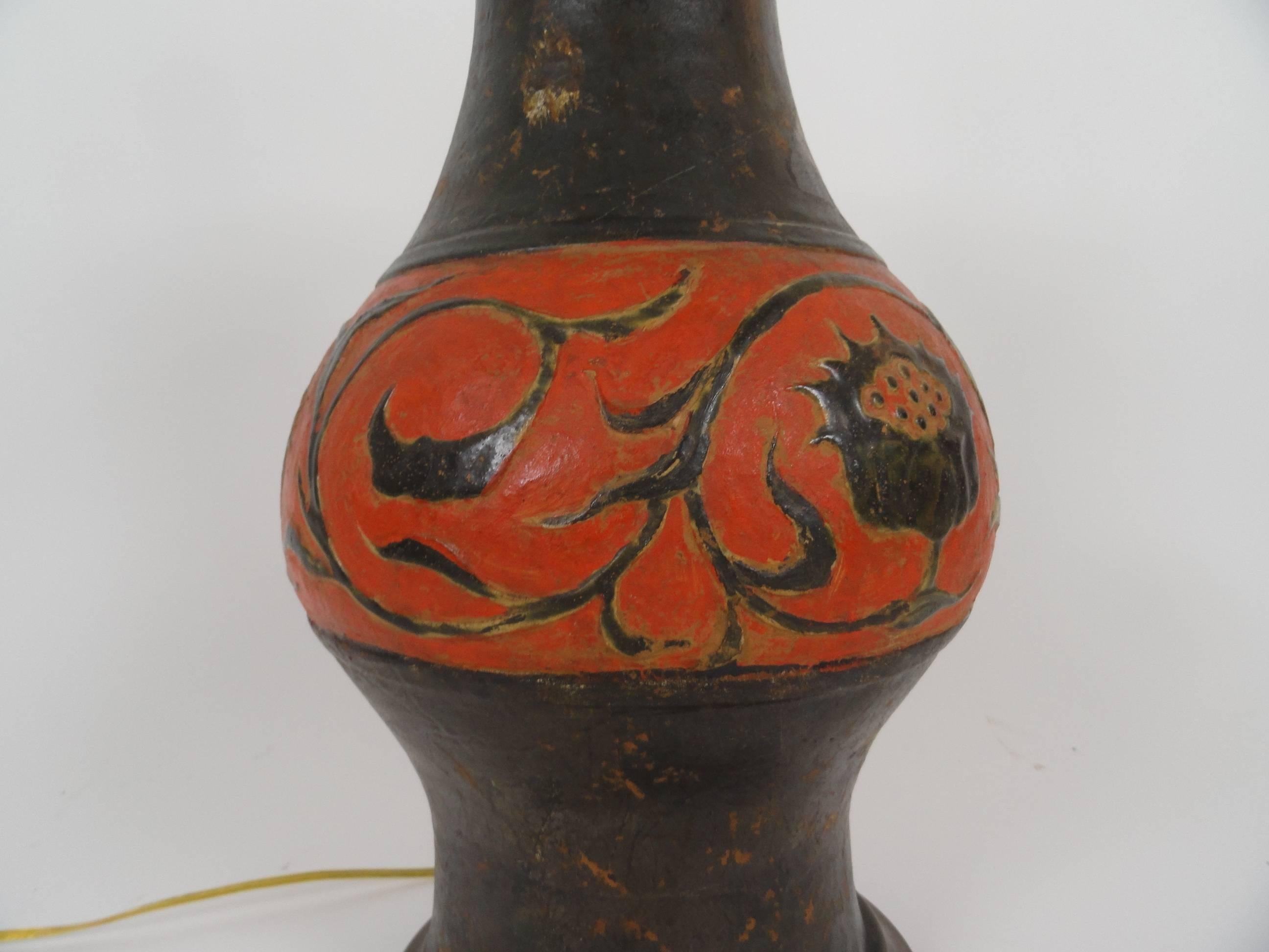 Etruscan style lamp. Ceramic vase lamp in the Etruscan taste with a naturally worn finish.
Measures: 20.5" high vase.