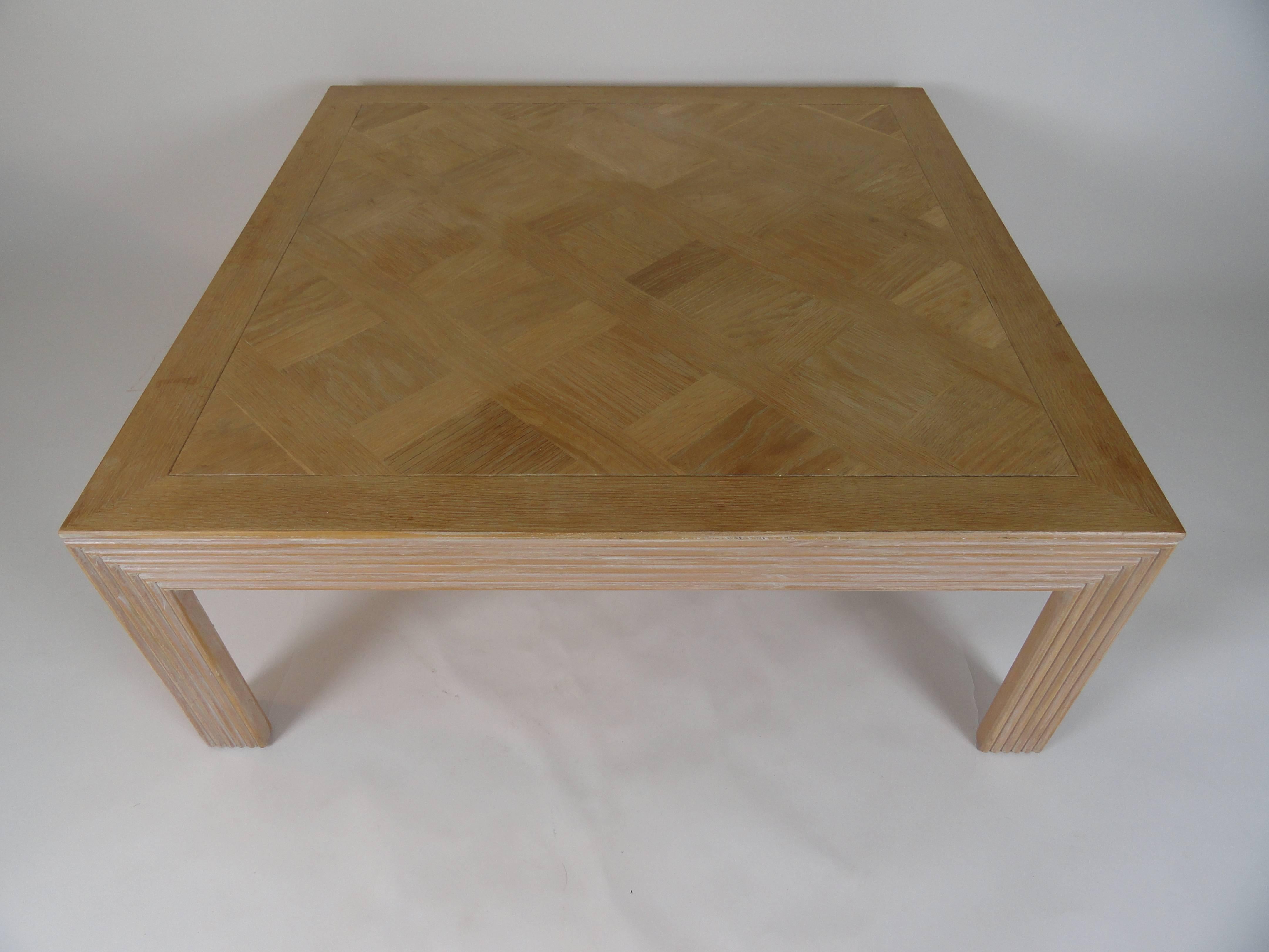 Square Lane Furniture inlaid bleached wood coffee table with fluted wood leg detail.
Stamped on bottom. Bleached top shows slight variations in finish across the piece.