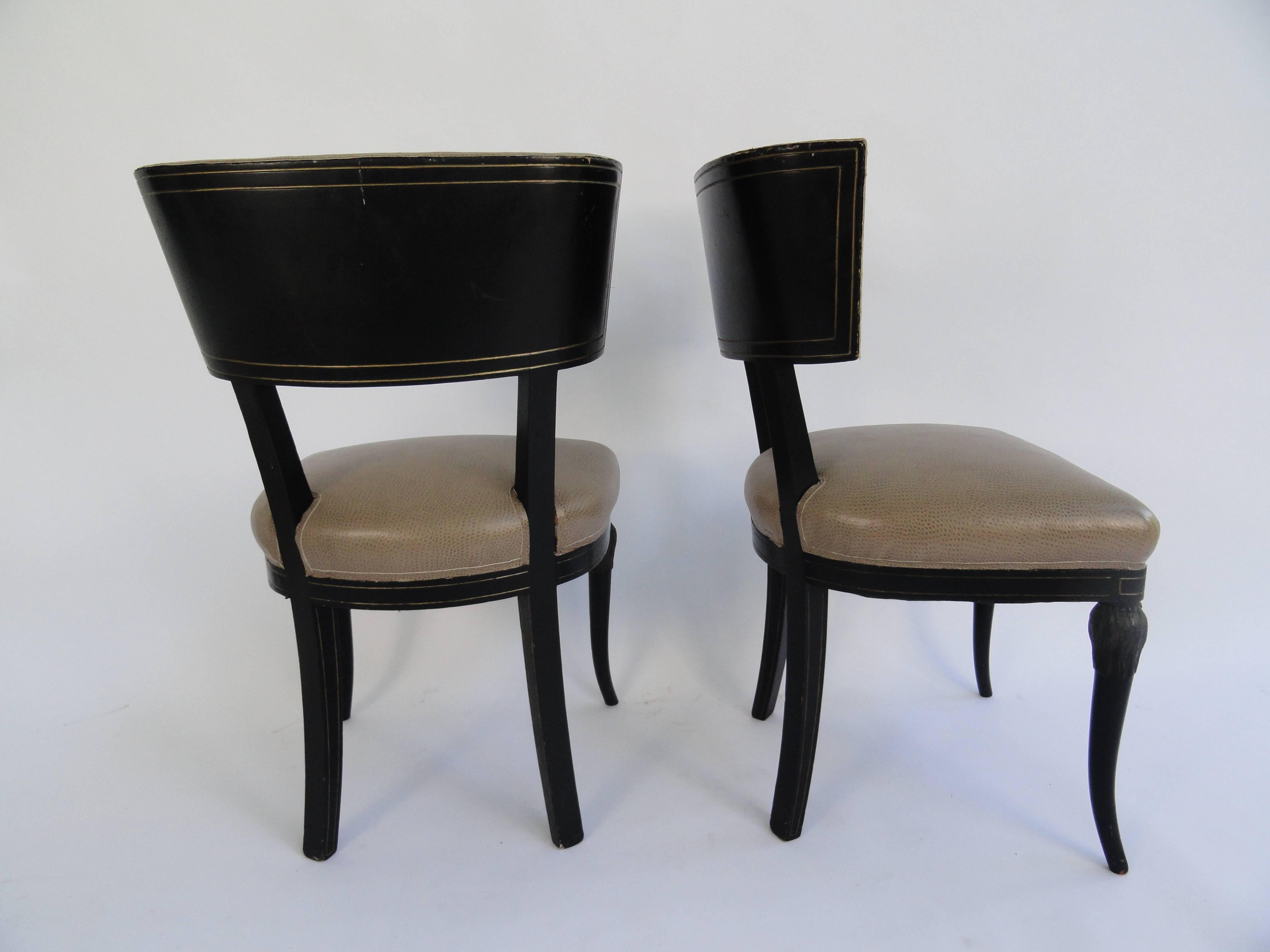 Set of four Maison Jansen side chairs with original ebony finish with gilt detail upholstered in faux ostrich.