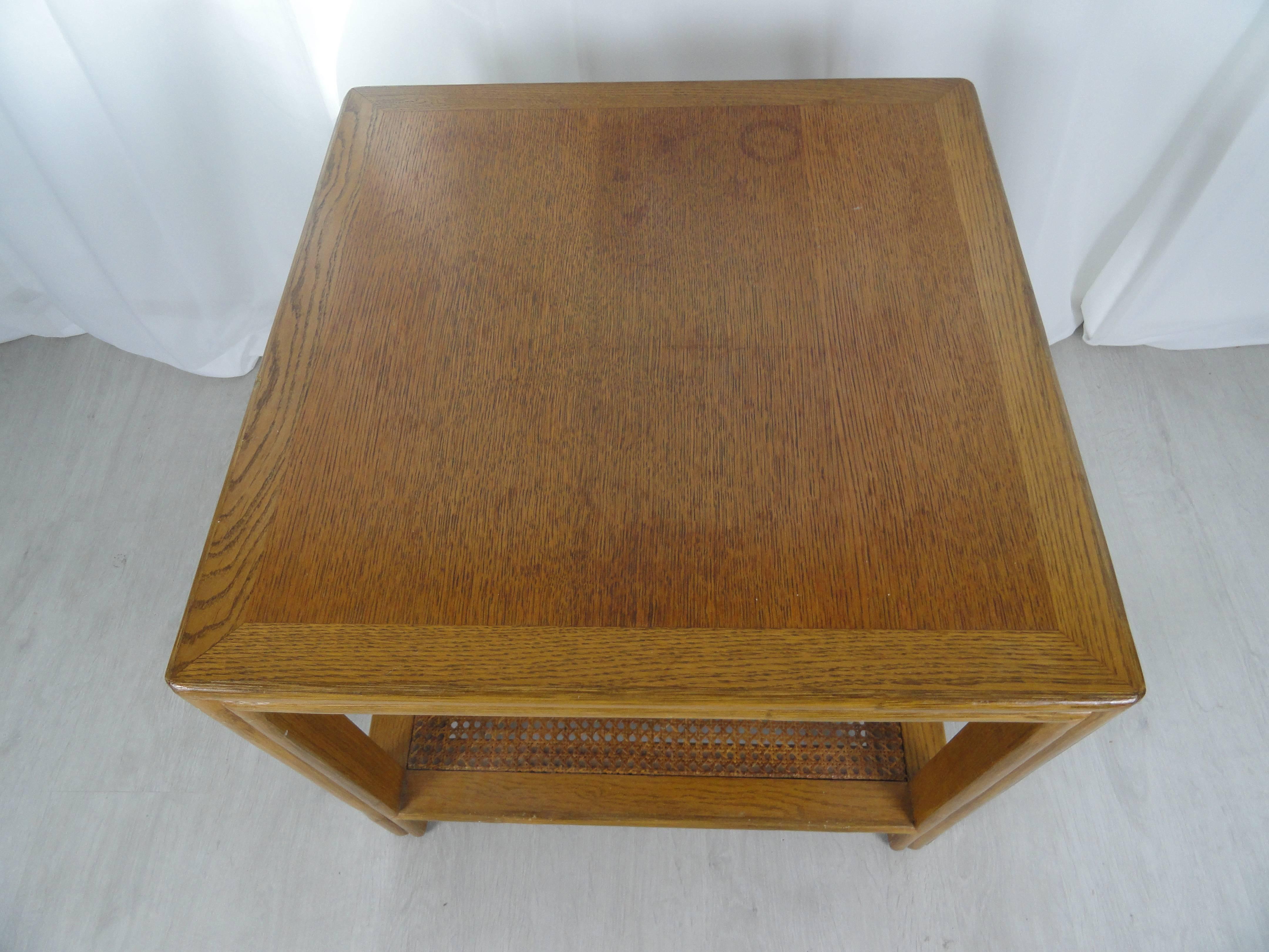 McGuire walnut and cane side table in a natural honey finish. Original cane, original finish. McGuire tag on bottom.