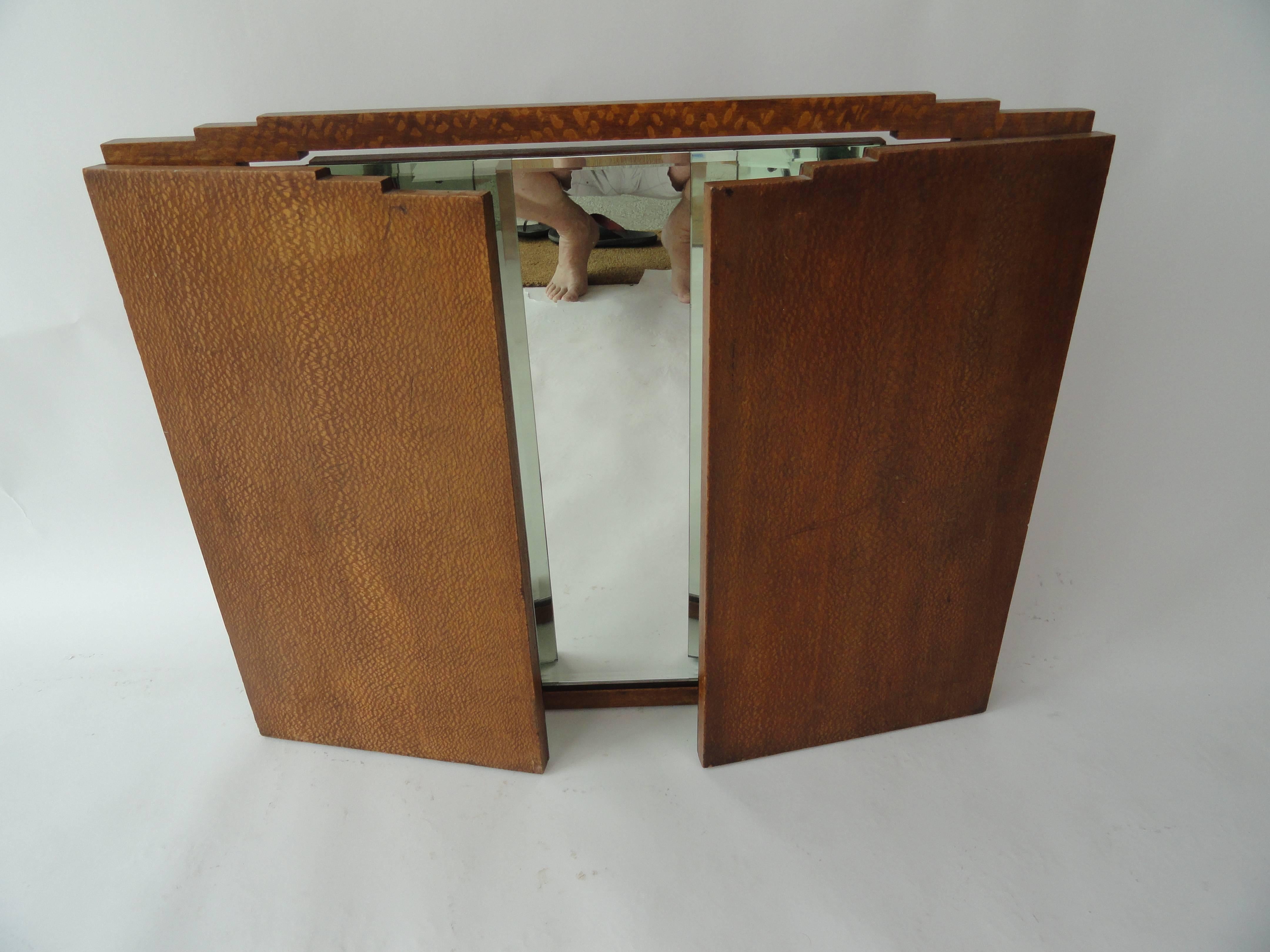 Three-part French Art Deco dressing mirror with tilting adjustable centre mirror and folding side mirrors. Mirrors are original and beveled. Set, mounted on beautiful wood frame.