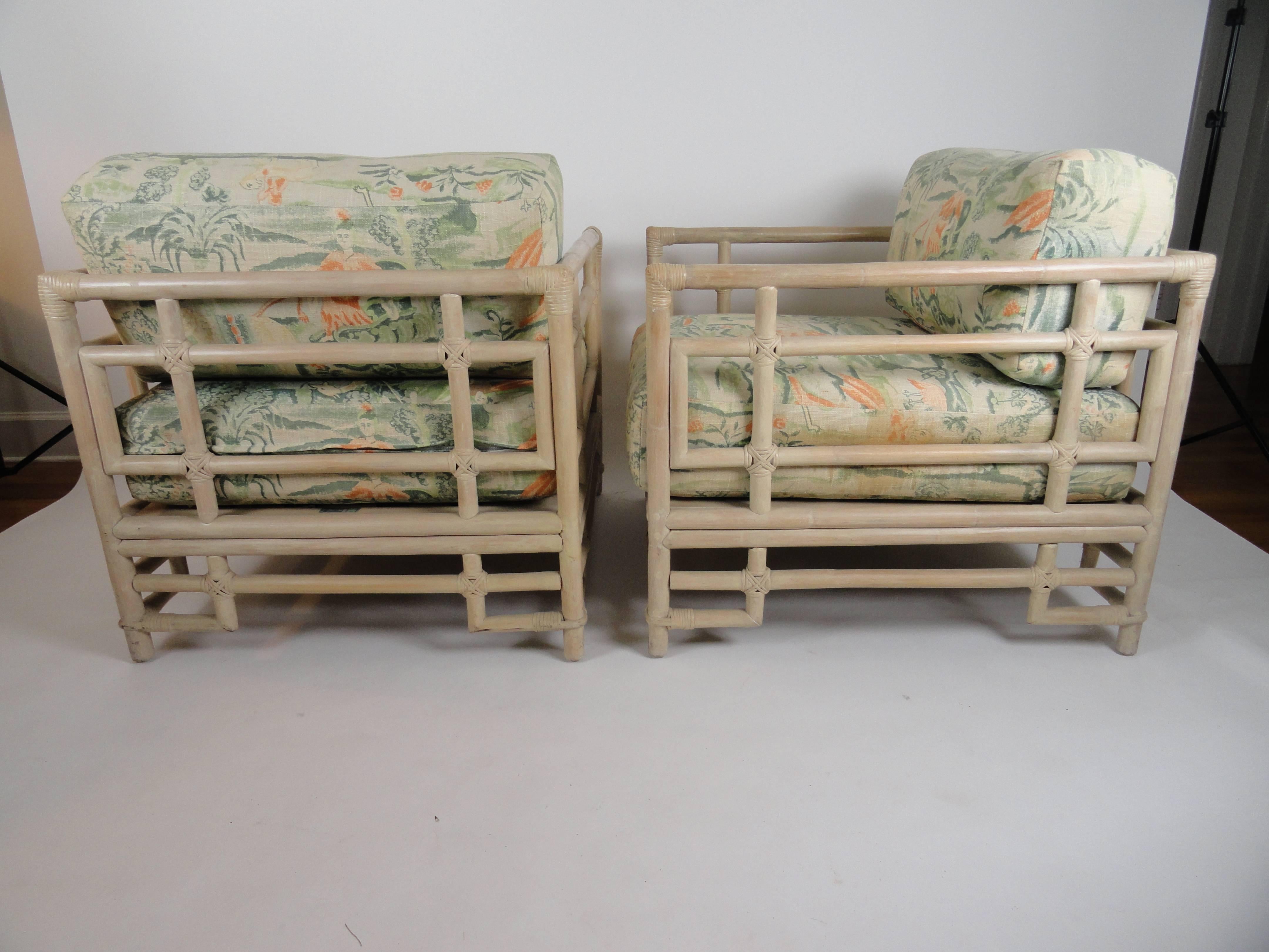 Pair of Ficks Reed armchairs. Newly restored from the 1960s. New strapping. The cushions have original block printed linen.