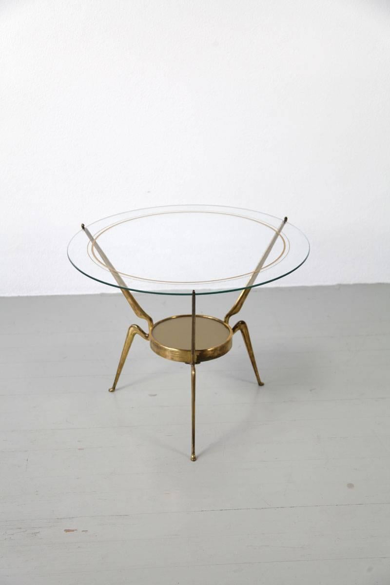 Side Table - Design by Cesare Lacca, Italy, 1950s. The round table top is further defined by slim gold bands and the mirror tray continues this motive within the design.
