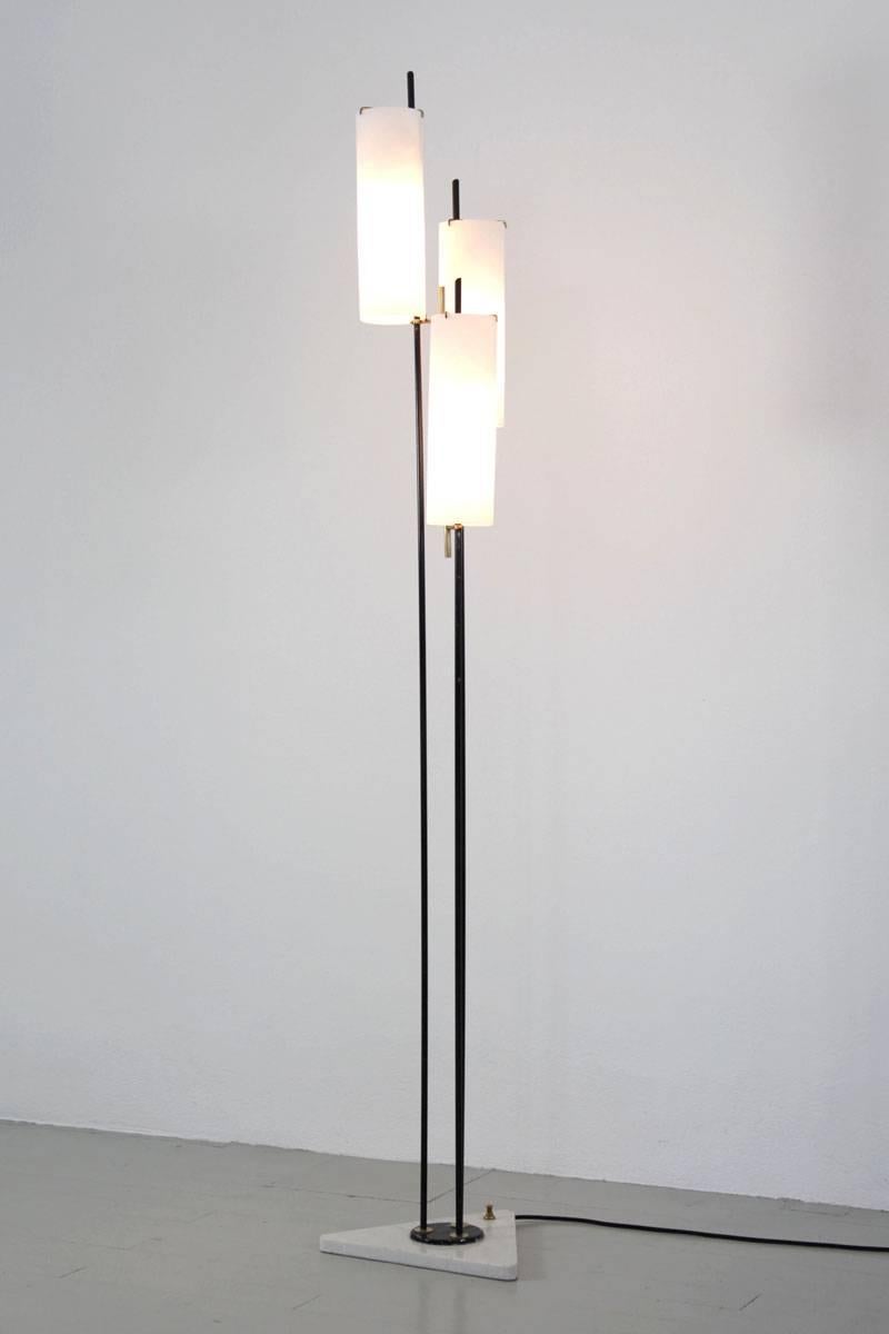 Floor Lamp - Design and Manufacturing by Stilnovo, Italy, 1960s. This lamp features opaline glass tubes, a lacquered metal frame and triangular marble base.