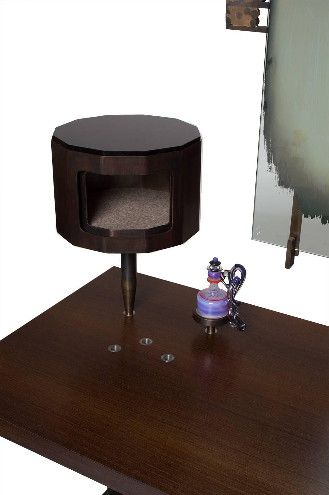 Datum vanity with a matching leather upholstered chair. Mirror with a blown perfume bottle and patinated brass holder. This piece is a unique creation from 2016.

All of the works from my Datum series have stainless steel inserts mounted flush to