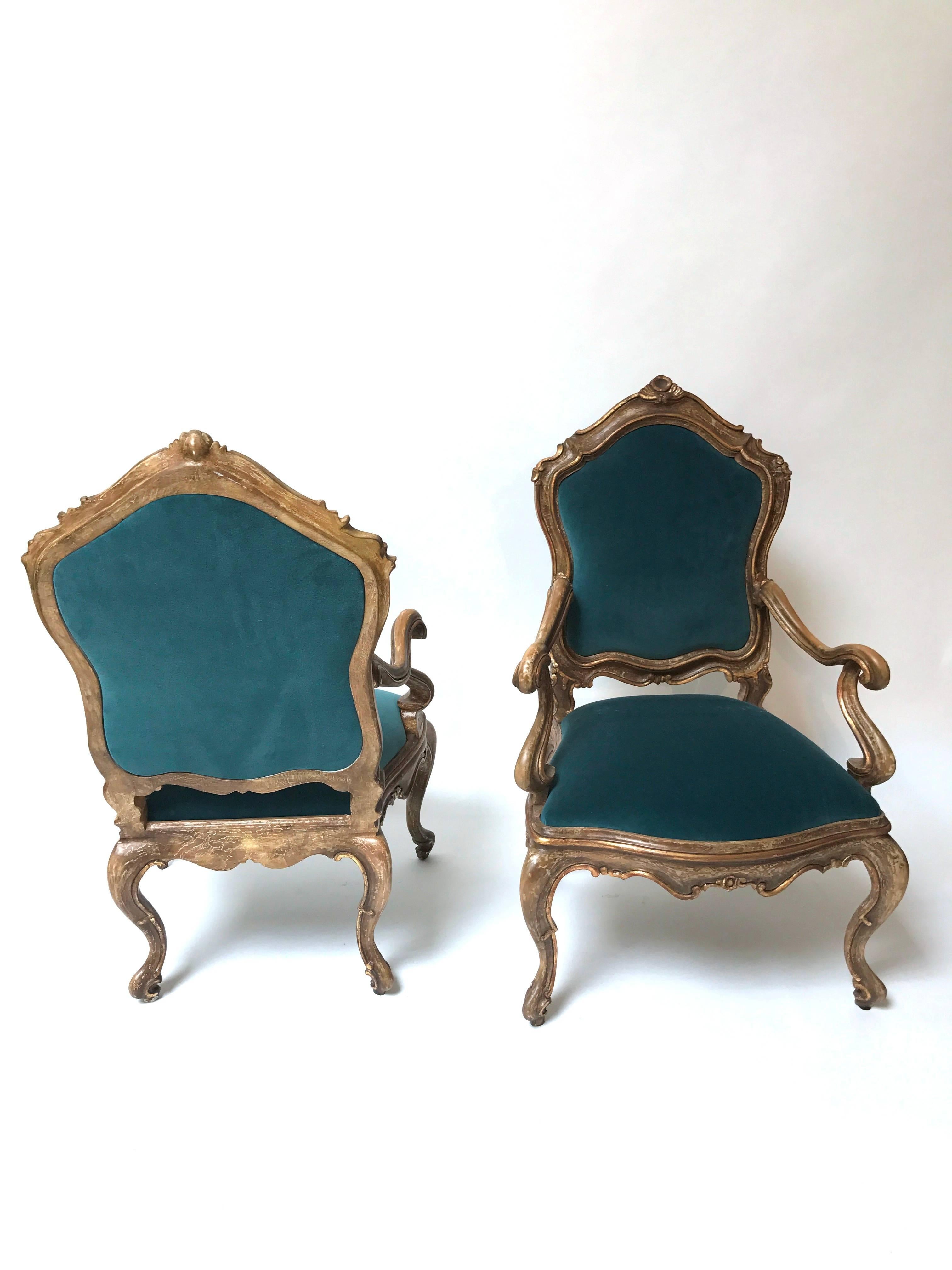 Pair of generous hand-carved custom Louis XV style Venetian rubbed gilt armchairs (copied after an original Venetian chair, circa 1740).