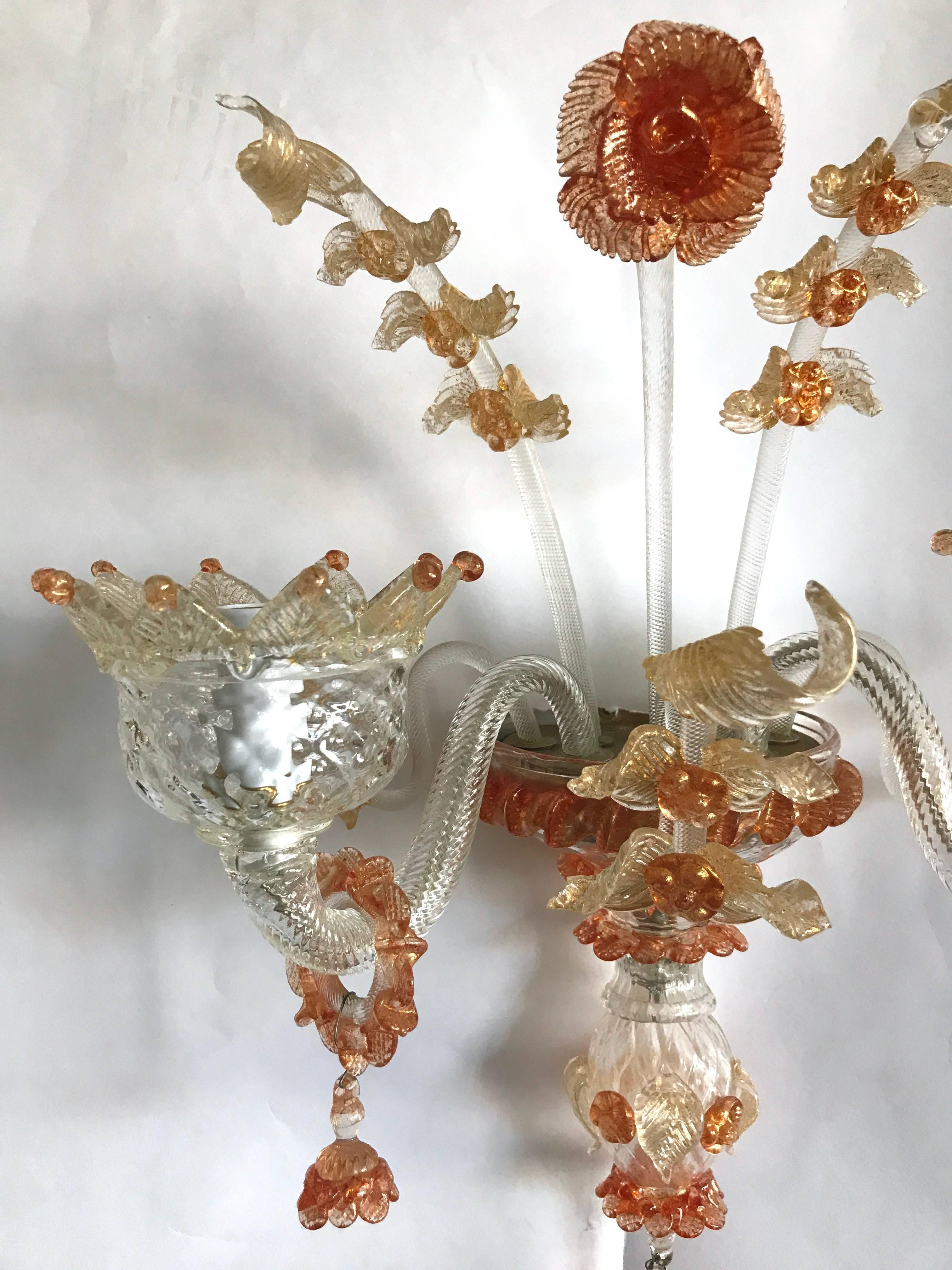 A lovely pair of Venetian glass sconces from Murano in perfect original condition, with unusual apricot coloring, circa 1930, UL wired.