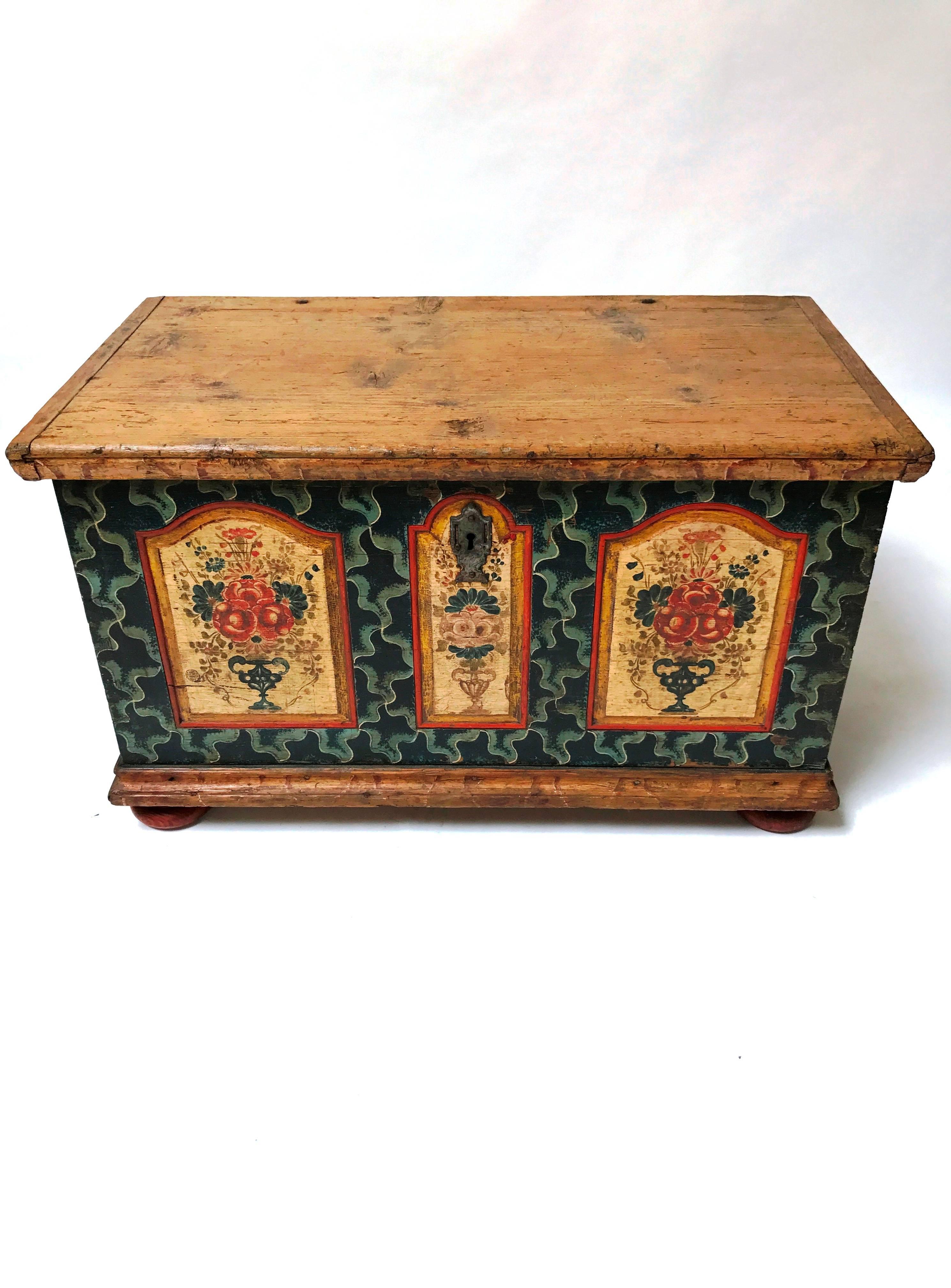 A nicely painted chest from Austria on feet, circa 1780