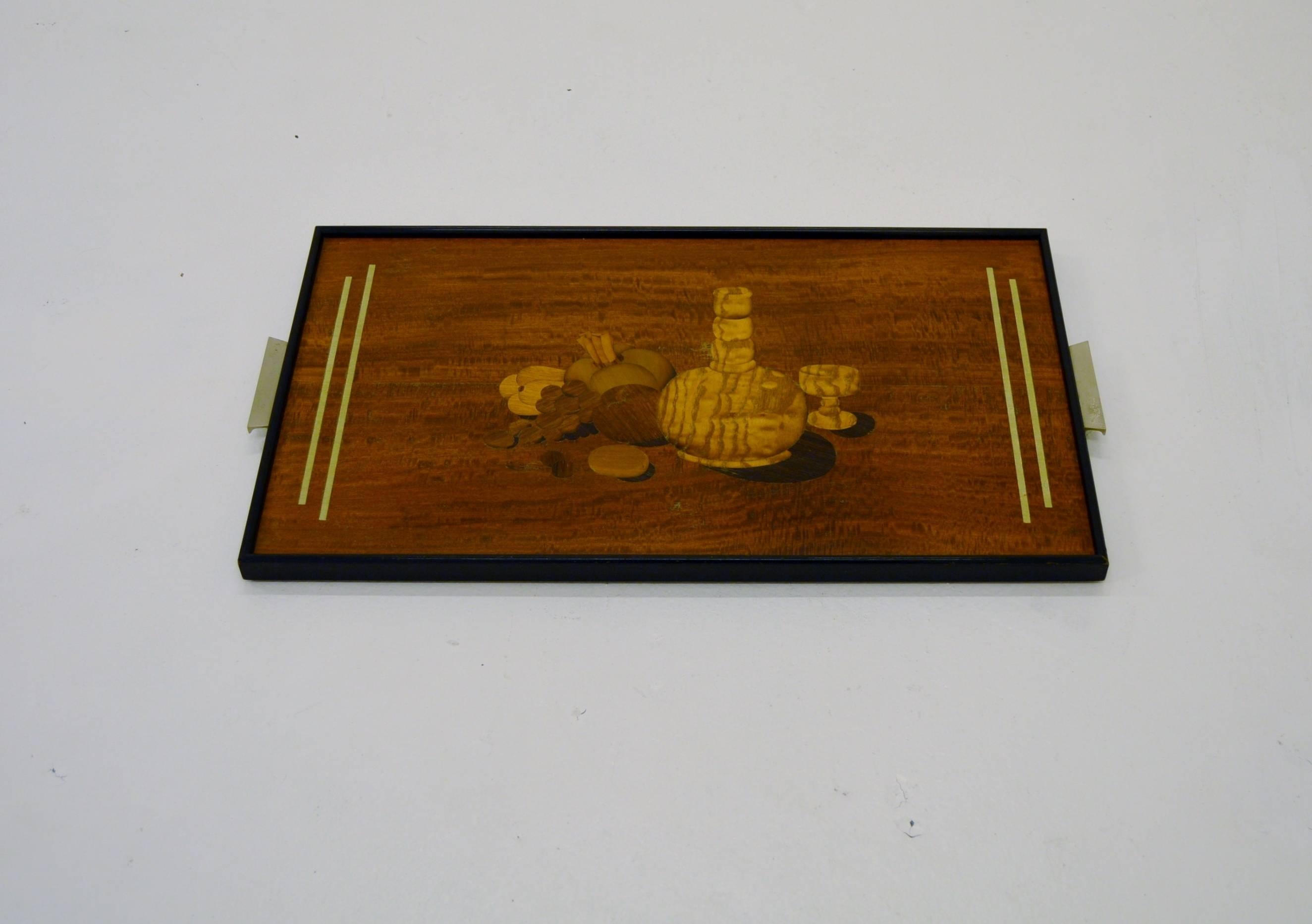 Very nice Art Deco tray with bar and fruit related inlays of, most likely pewter, and mixed woods. Designed by artist at Mjölby Intarsia in Sweden, circa 1930.