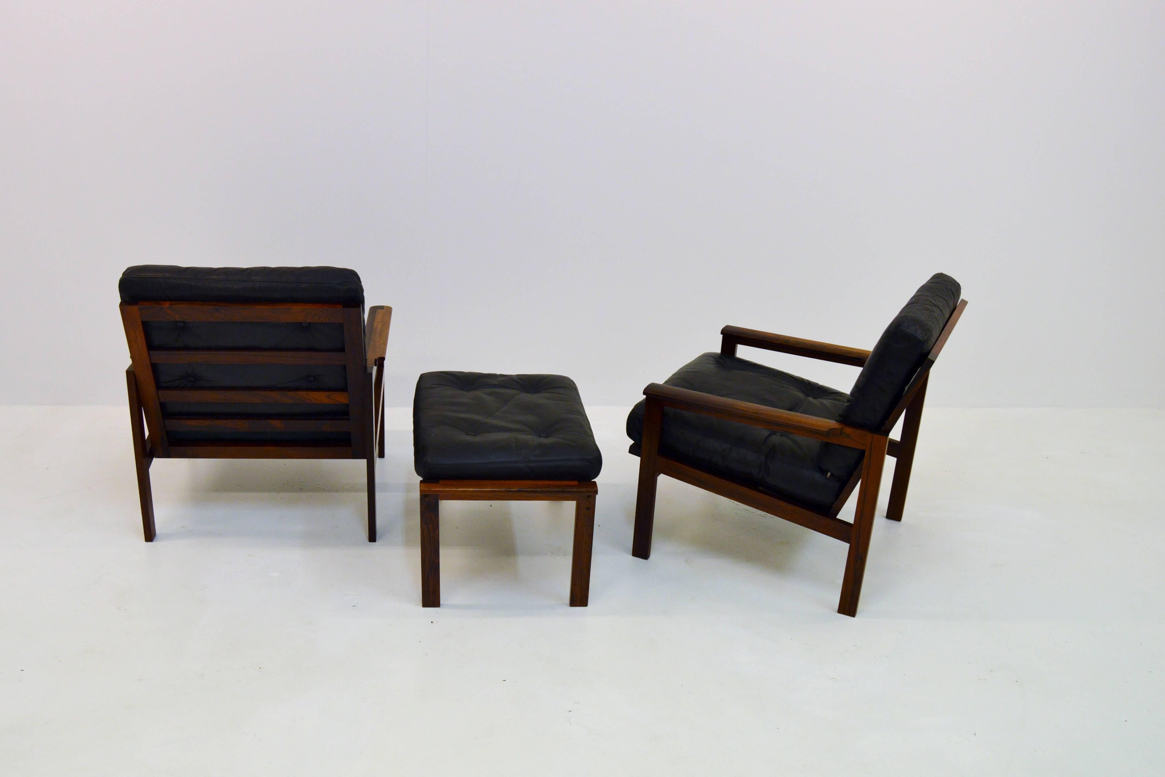 20th Century Pair of Illum Wikkelsø Capella Easy Chairs and Stool in Rosewood and Leather