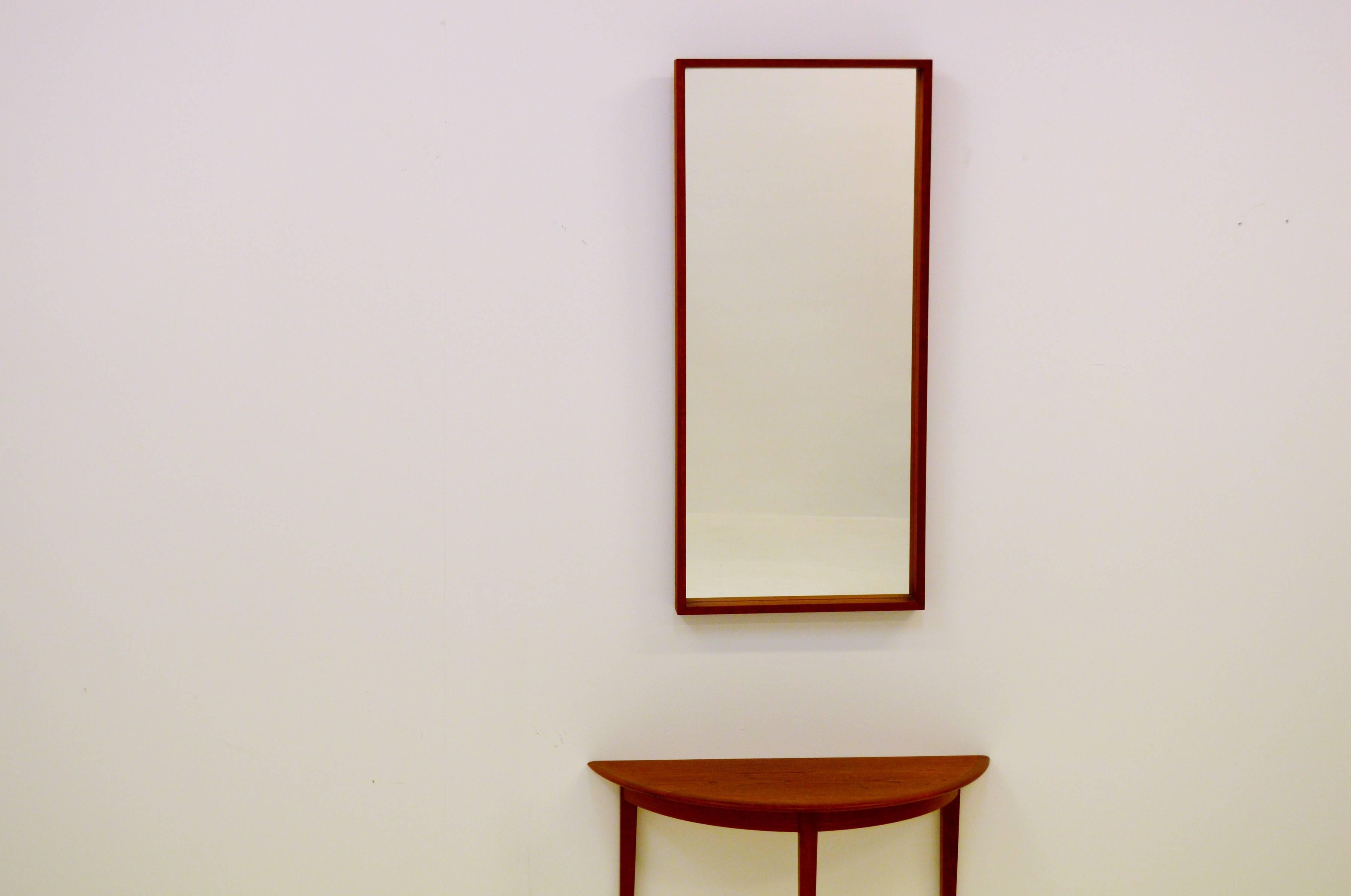 Small table shaped as a half moon and one mirror. Both produced by Glas & Trä Hovmantorp, Sweden.
Mirror size 96 x 44 cm.
 