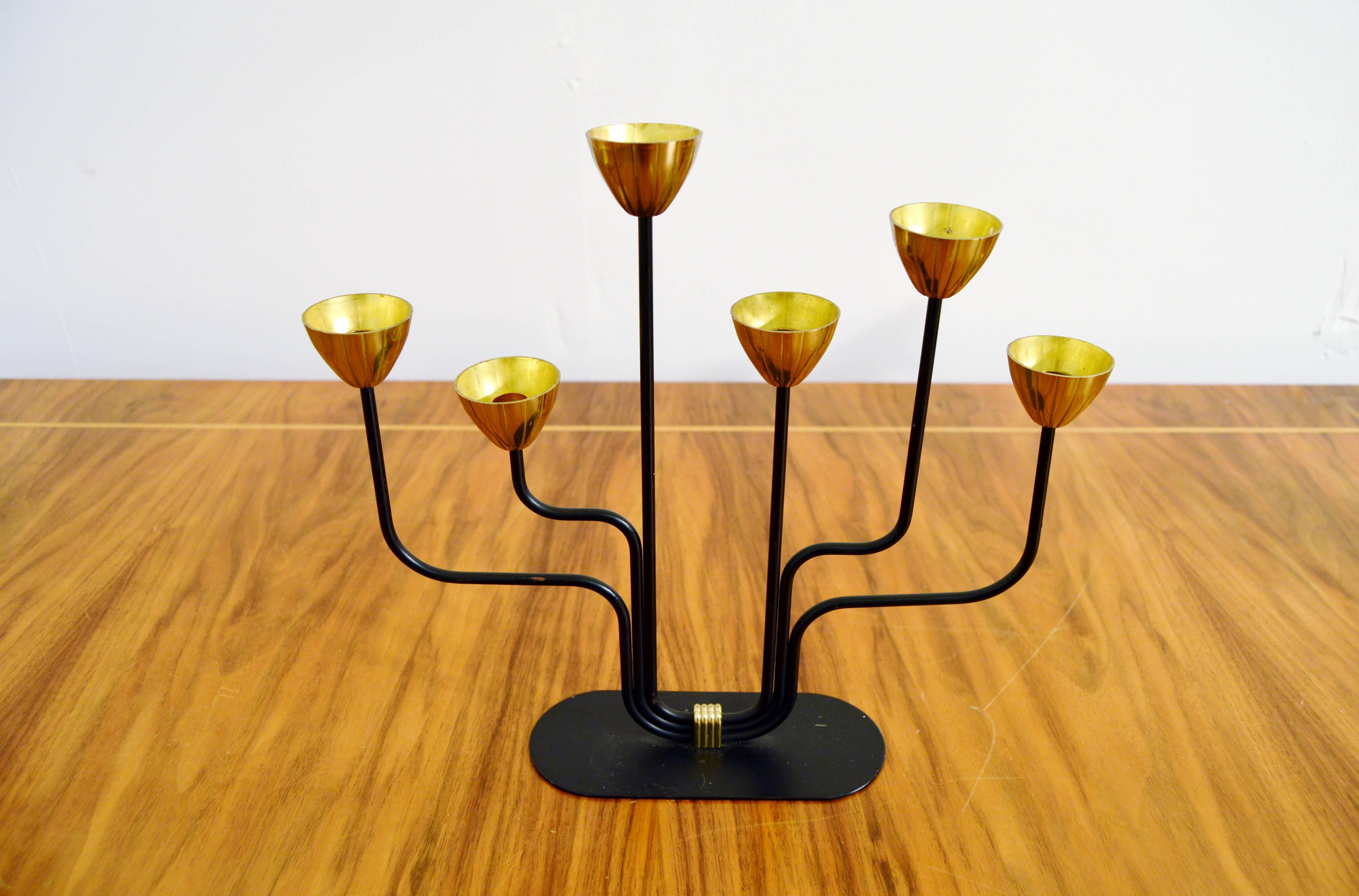 Candelabra by Gunnar Ander for Ystad Metall.
Year circa 1950.
Brass and black iron in very good vintage condition.