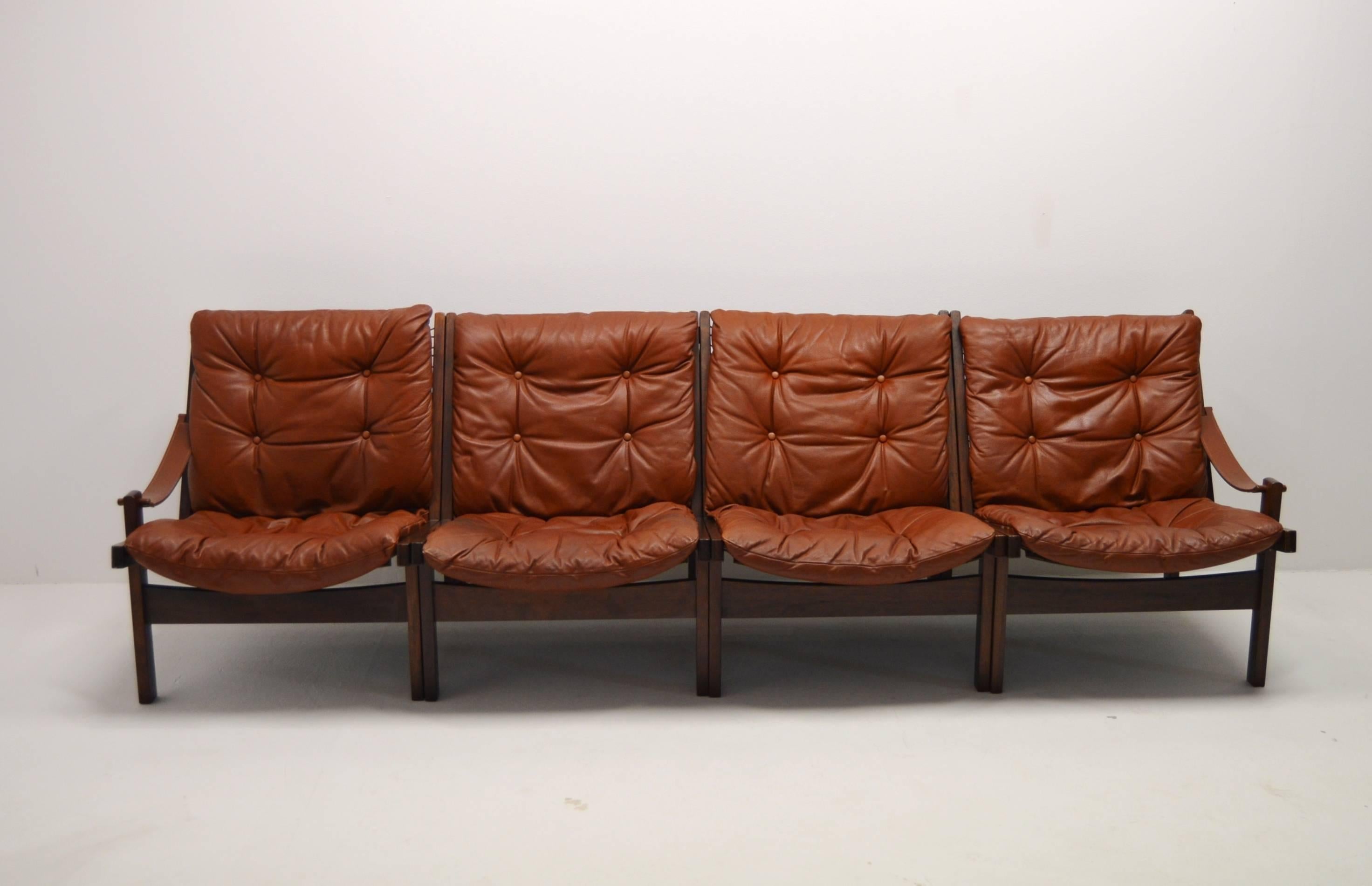 Rare sofa set by Torbjørn Afdal, Bruksbo Norway.
With this set you can combine your own sofa group. A four-seat sofa, a two-seat sofa and two armchairs or other possible combinations.
Two sections with one armrest each, and these are supposed to