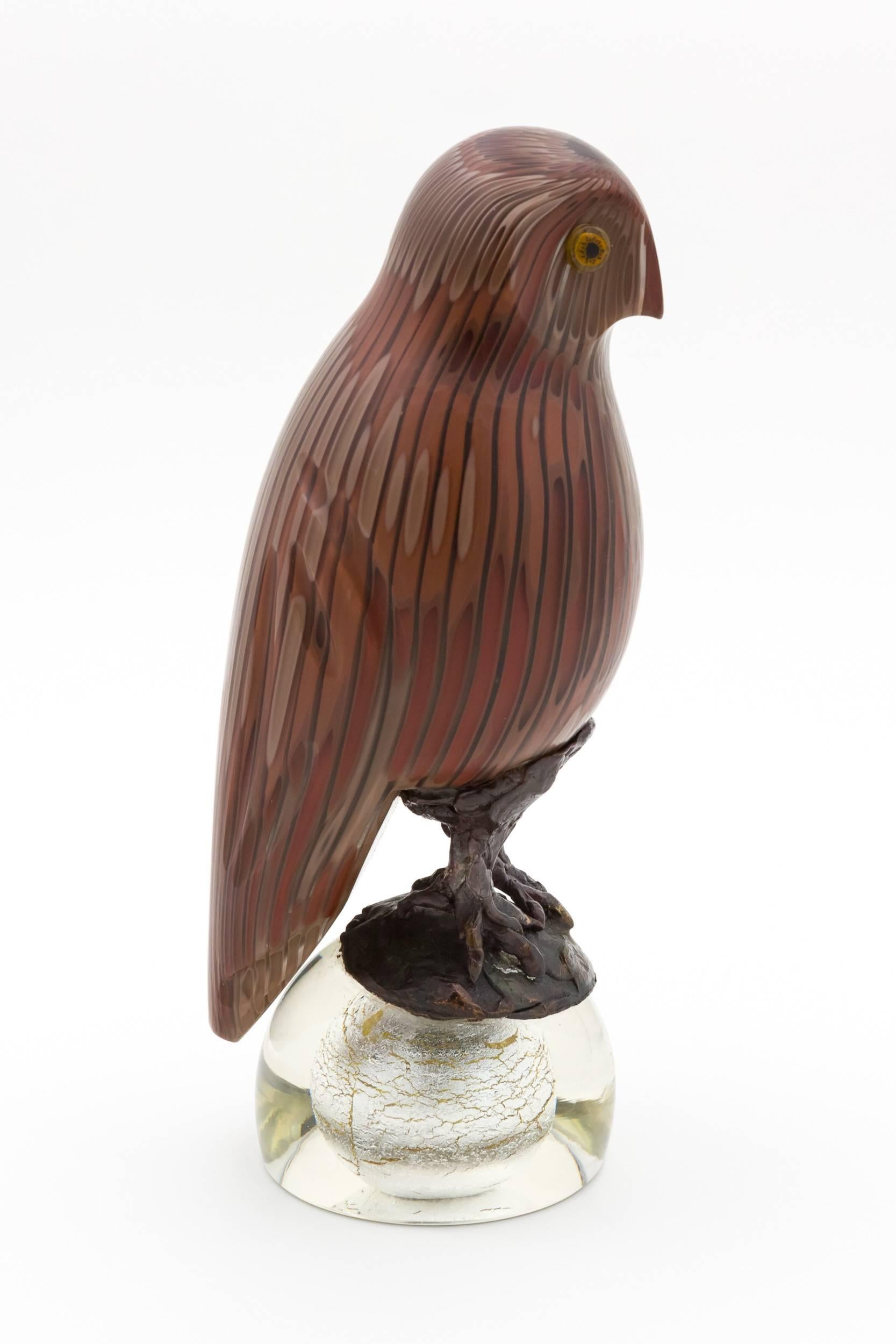 Rare figure of an owl designed by Toni Zuccheri for the famous manufacture Venini in Murano (Italy).
A cane glass entirely carved by hand on a bronze foot.
Note the lovely silver inclusion base.