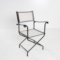 Pair of “Metteur en scène” Armchairs by Jacques Adnet, France, circa 1950