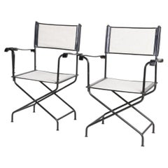 Pair of “Metteur en scène” Armchairs by Jacques Adnet, France, circa 1950