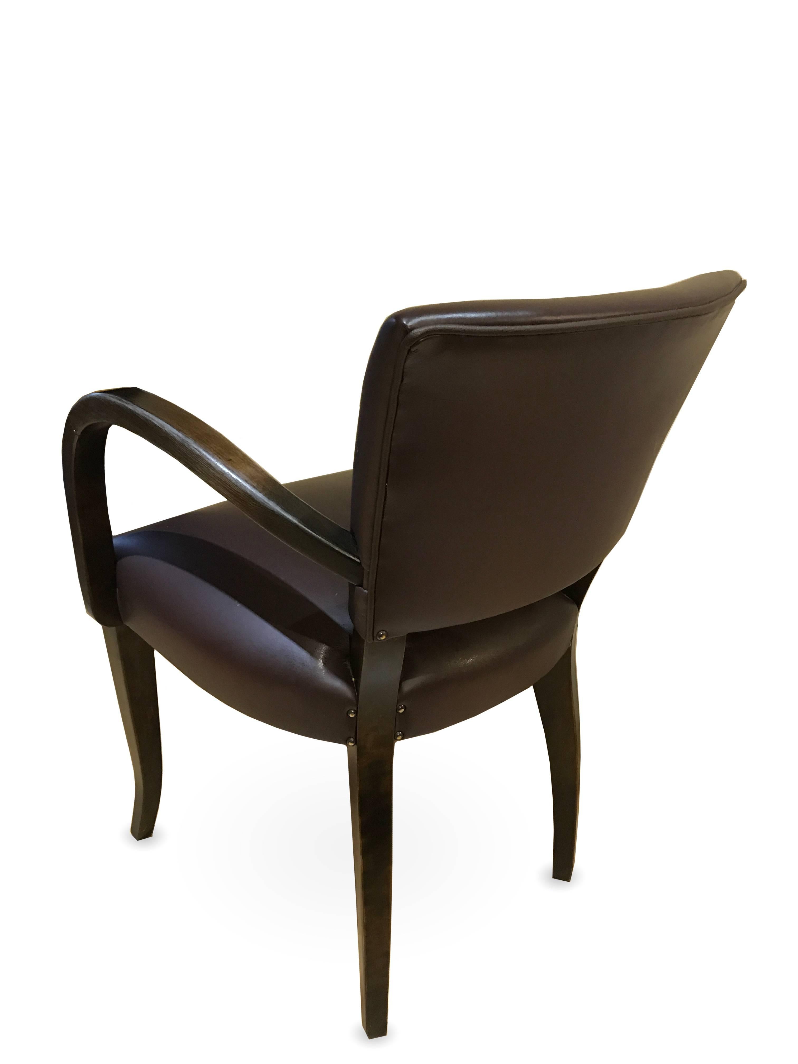 Momero Dining Chair is inspired by one of the most famous Art Deco dining chairs. 
Presented model - dark chocolate leather and timber with gloss finish (frame). 
It comes in two variations with and without armrest. Various colours and upholstery
