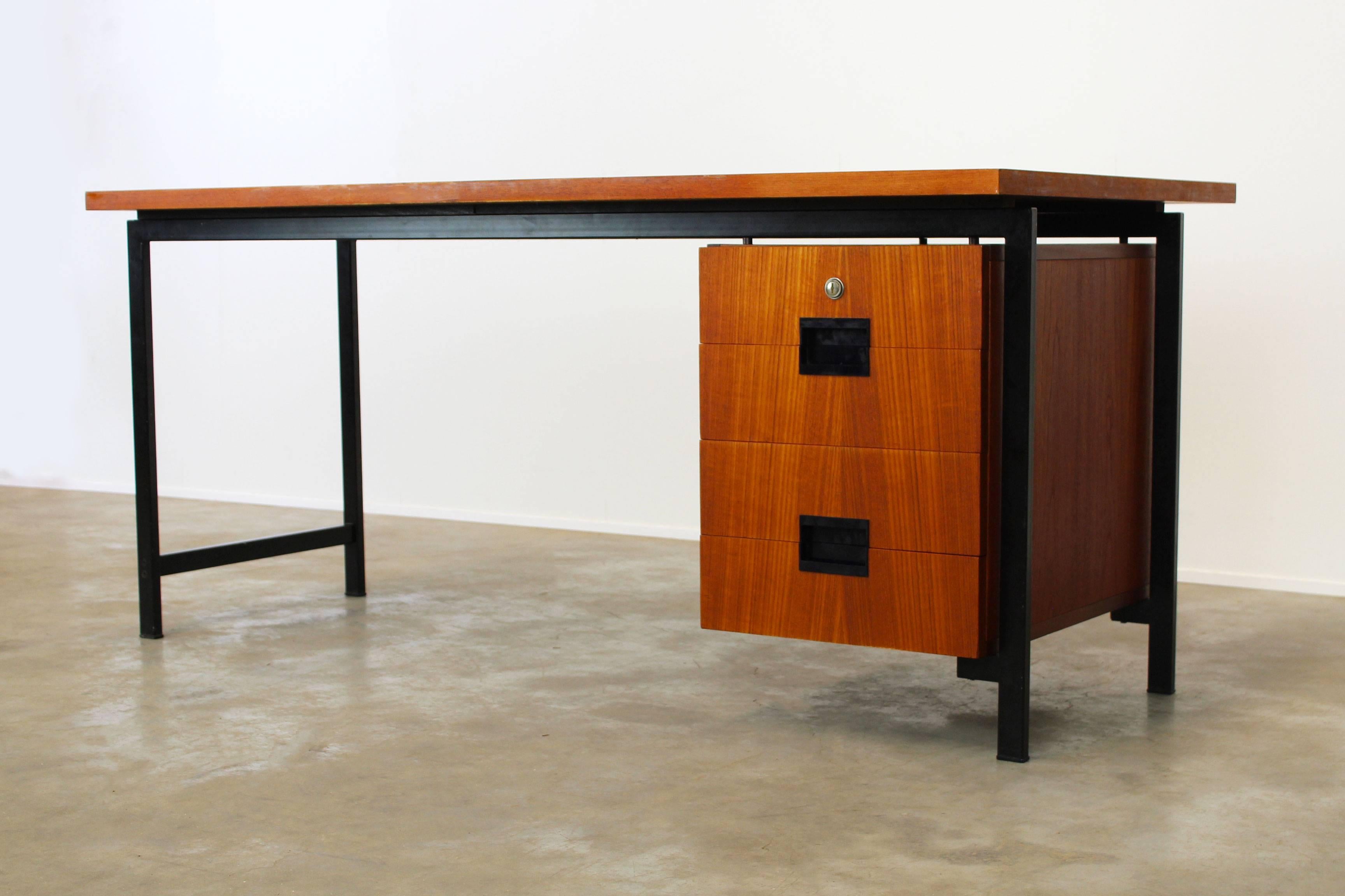 Large EU02 Japanese series desk designed by Cees Braakman for Pastoe. Rare EU02 model with only right side drawers instead of usual double sided drawers. Wonderful and rare desk with teak and Minimalist black metal frame. This desk can be used