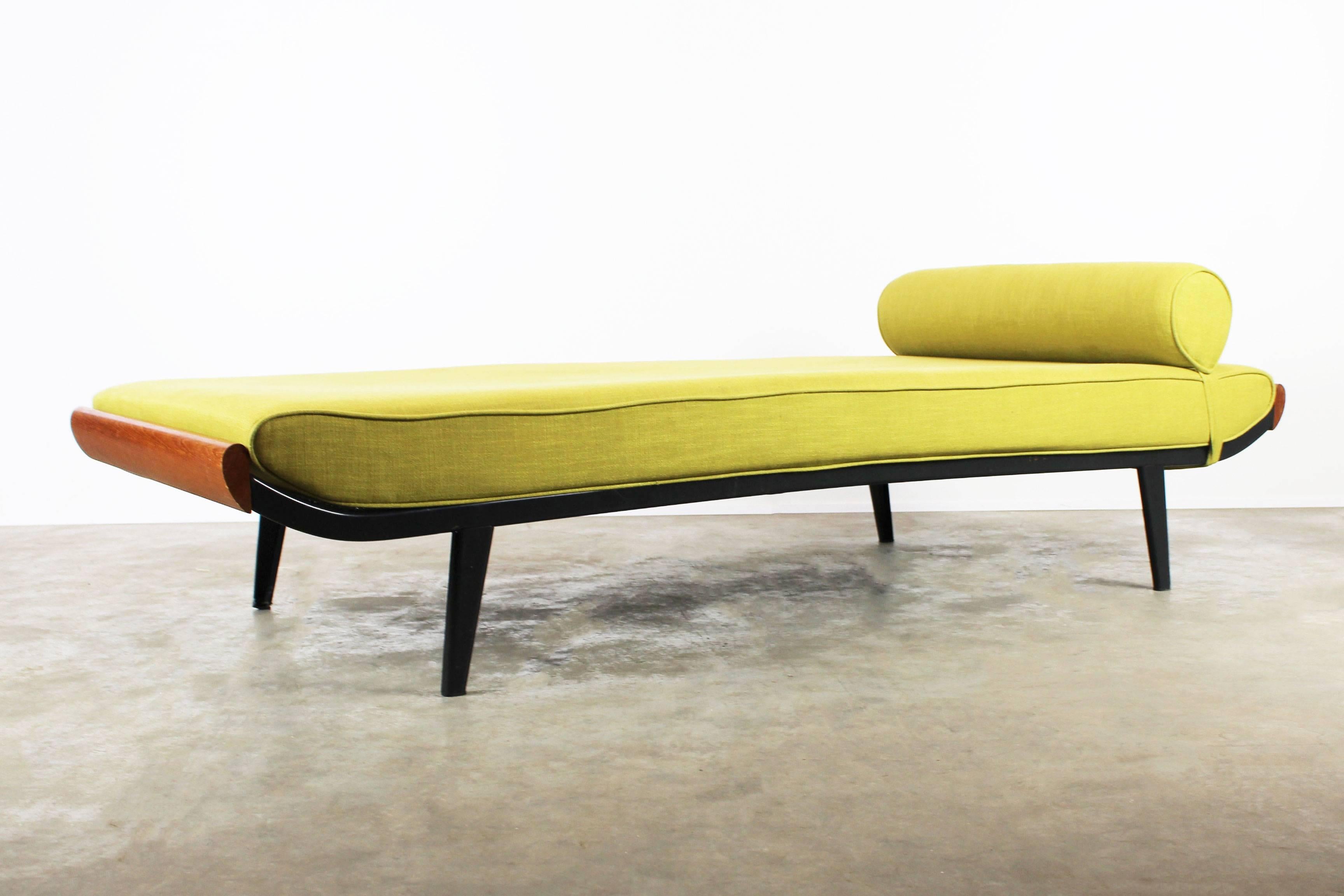 Cleopatra daybed designed by Dick Cordemeijer for Auping, 1953. Minimalist black frame with solid teak head and footrest. Very comfortable and stylish. Fits perfectly in any midcentury or modern interior.