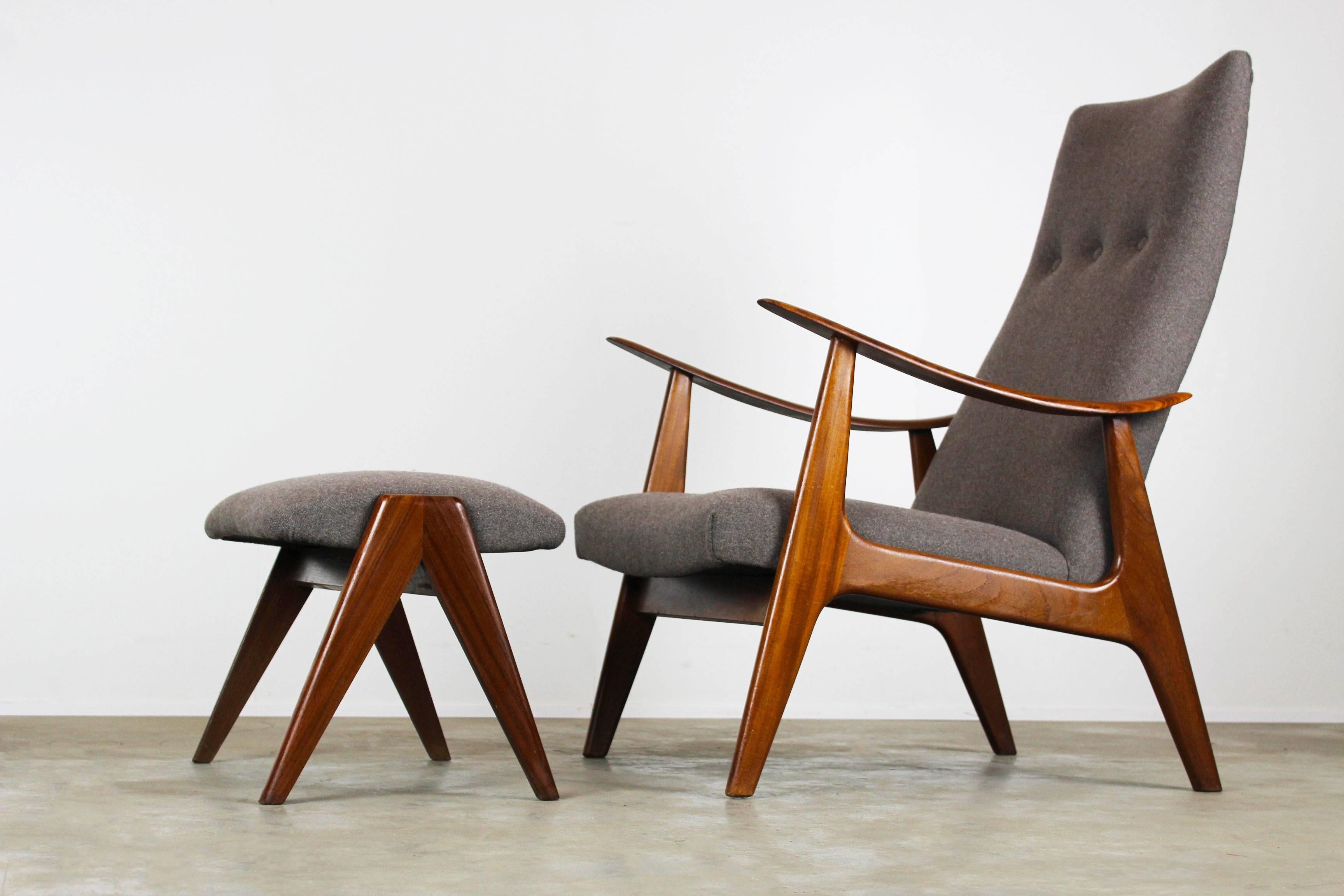 Wonderful Lounge chair and ottoman designed by Dutch designer Louis van Teeffelen for Webe in 1960. Organic sculpted solid teak frame that always catches your eye, new upholstery in grey (color matches the original upholstery). A set that will make