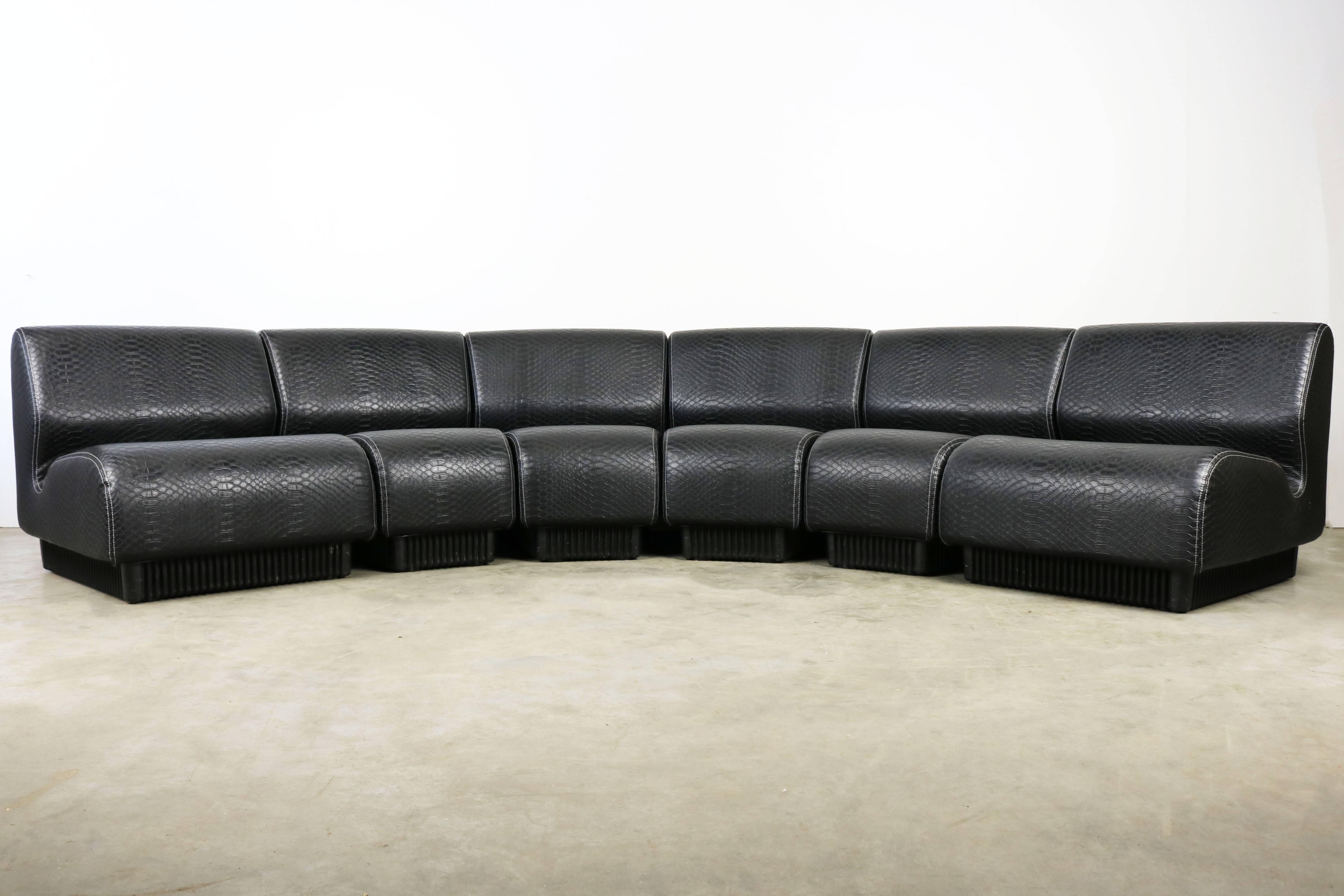 Wonderful midcentury modular sofa by Don Chadwick for Herman Miller 1970 consisting of six pieces.
Professionally re-upholstered in a high quality exceptional black snakeskin upholstery (faux leather).
The sofa is made out of six modules and can