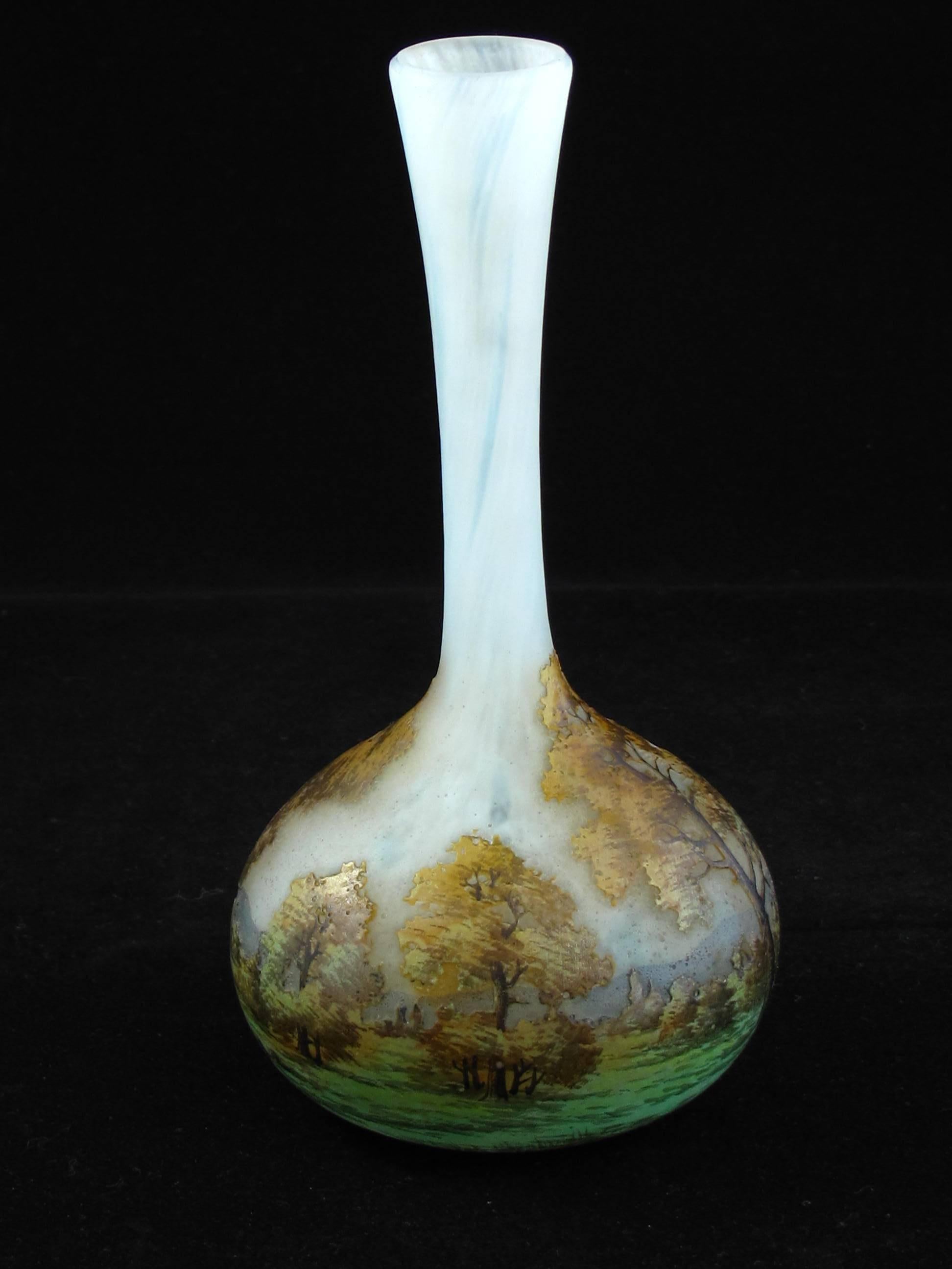 A superb quality Daum glass Paysage Lorraine cameo and enamel solifleur vase. Very finely detailed and with excellent color. A stunning landscape vase, French, circa 1905-1910. Signed Daum Nancy and with the painters initials HF to the underside.