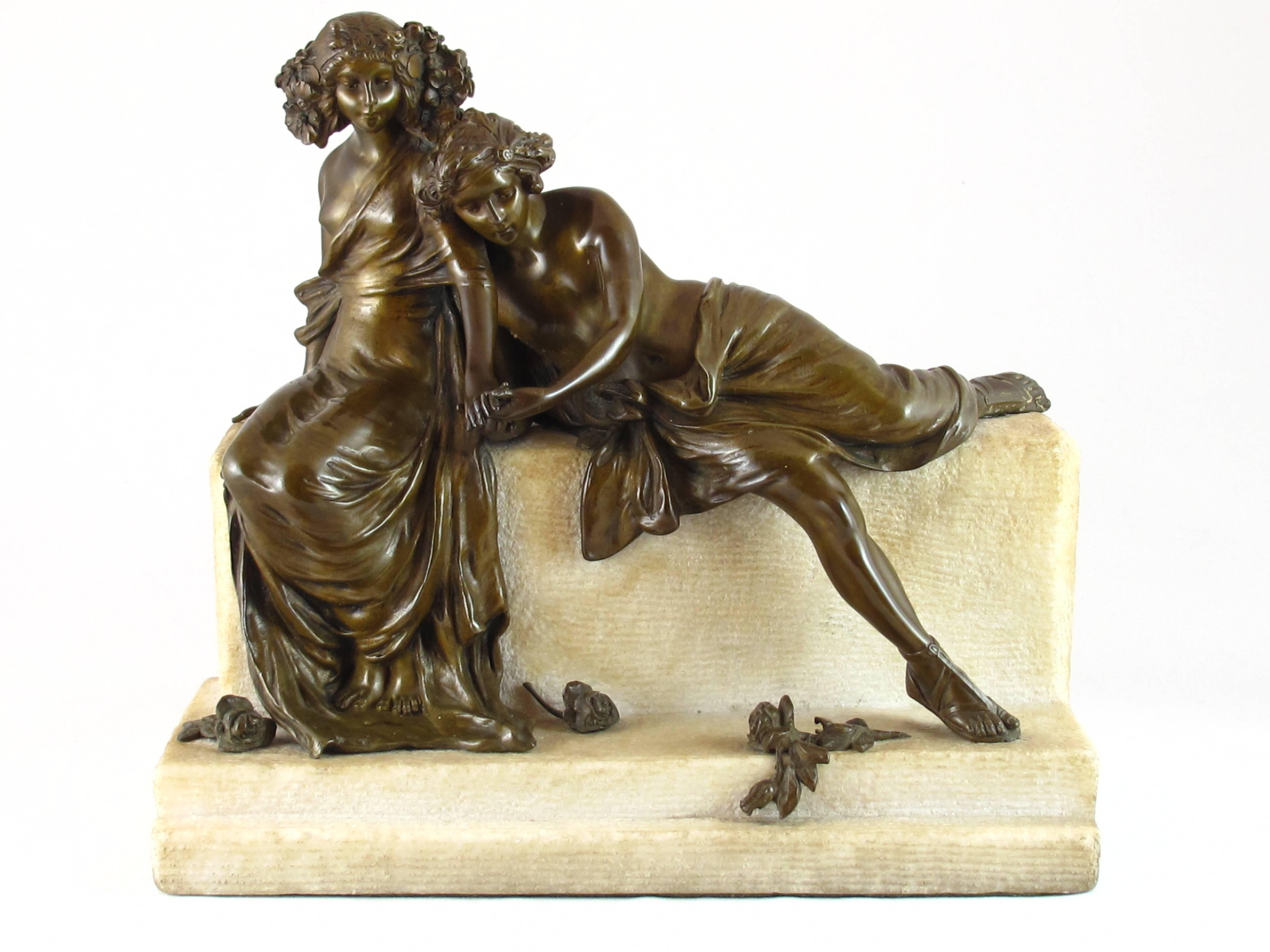 A beautiful Art Nouveau patinated Austrian bronze -The Lovers. Showing a couple seated on a carved marble base. The man is holding the woman by the hand and a ring can be seen on her third finger. Very finely detailed and cast. Signed in the marble