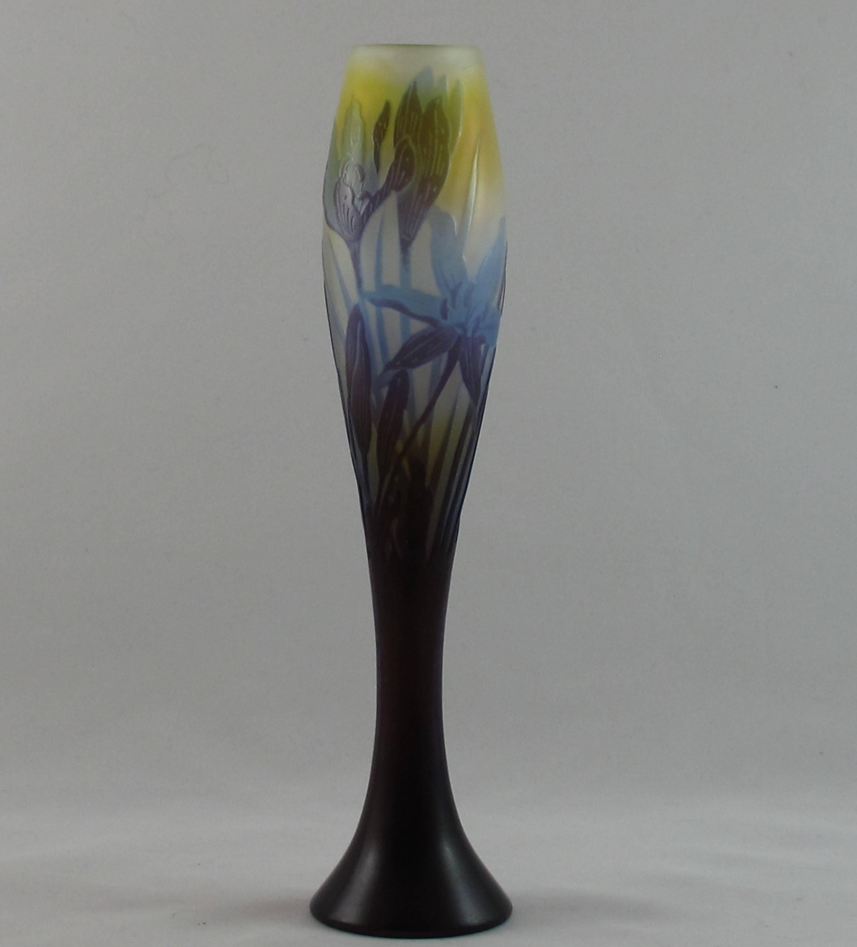 Art Nouveau four color cameo glass vase decorated with crocus flowers and leaves by Emile Galle. Stunning colors. 'Japanese ' style signature . Approximate 25 cm tall. French, circa 1895. Excellent original condition and a stunning piece. A