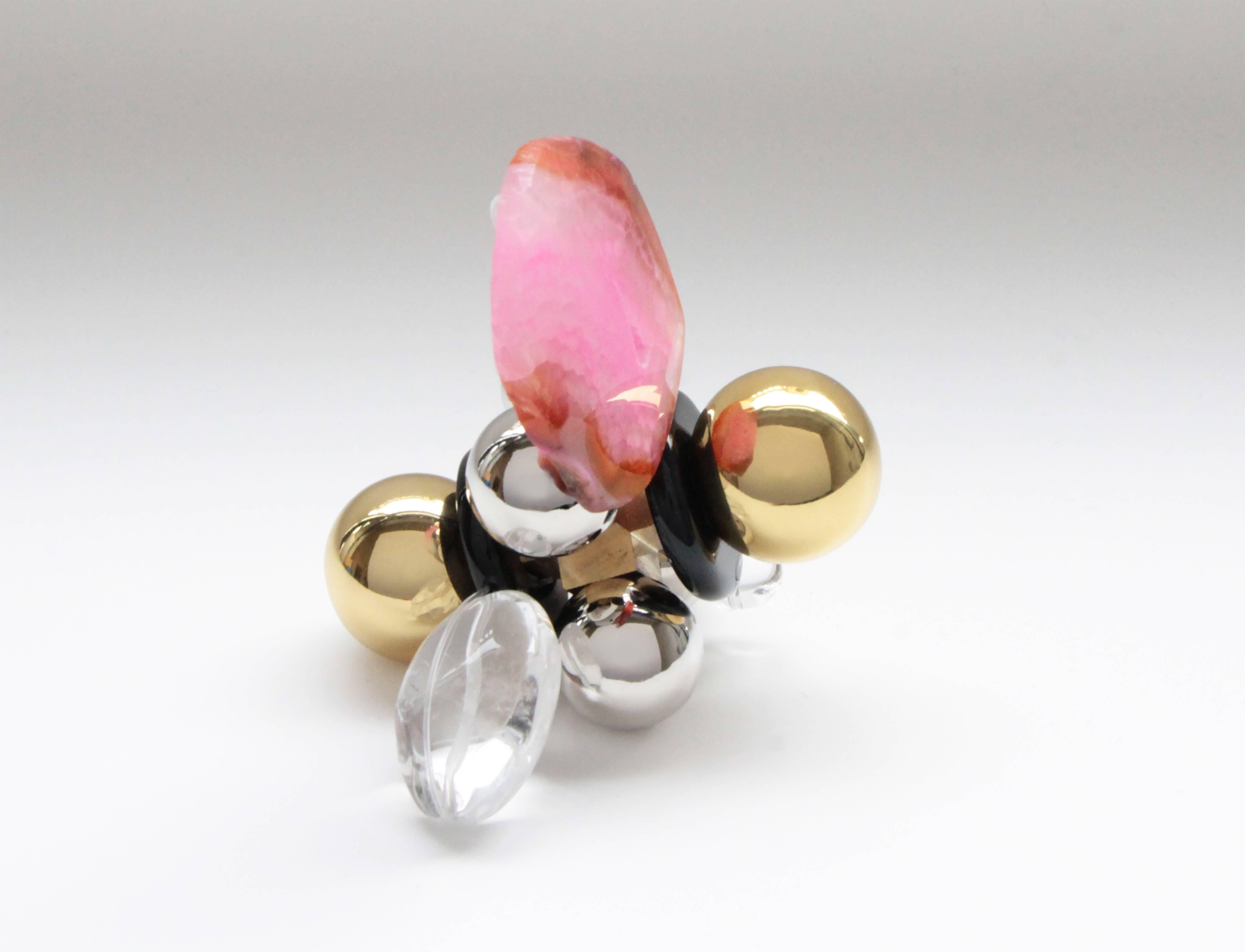 'Quarza' is hand crafted from polished and sealed cast brass, nickel-plated spheres, glass beads, pink and clear quartz with black stone. This contemporary object makes for an ideal paperweight or small sculpture curiosity. Each one is set with