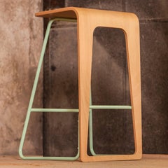 Contemporary bar stool by Le Point D with metal color frame and plywood seat