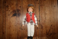 20th-Century Porcelain Boy Doll with Plaid Shirt, Red Vest and Cap - 2C245